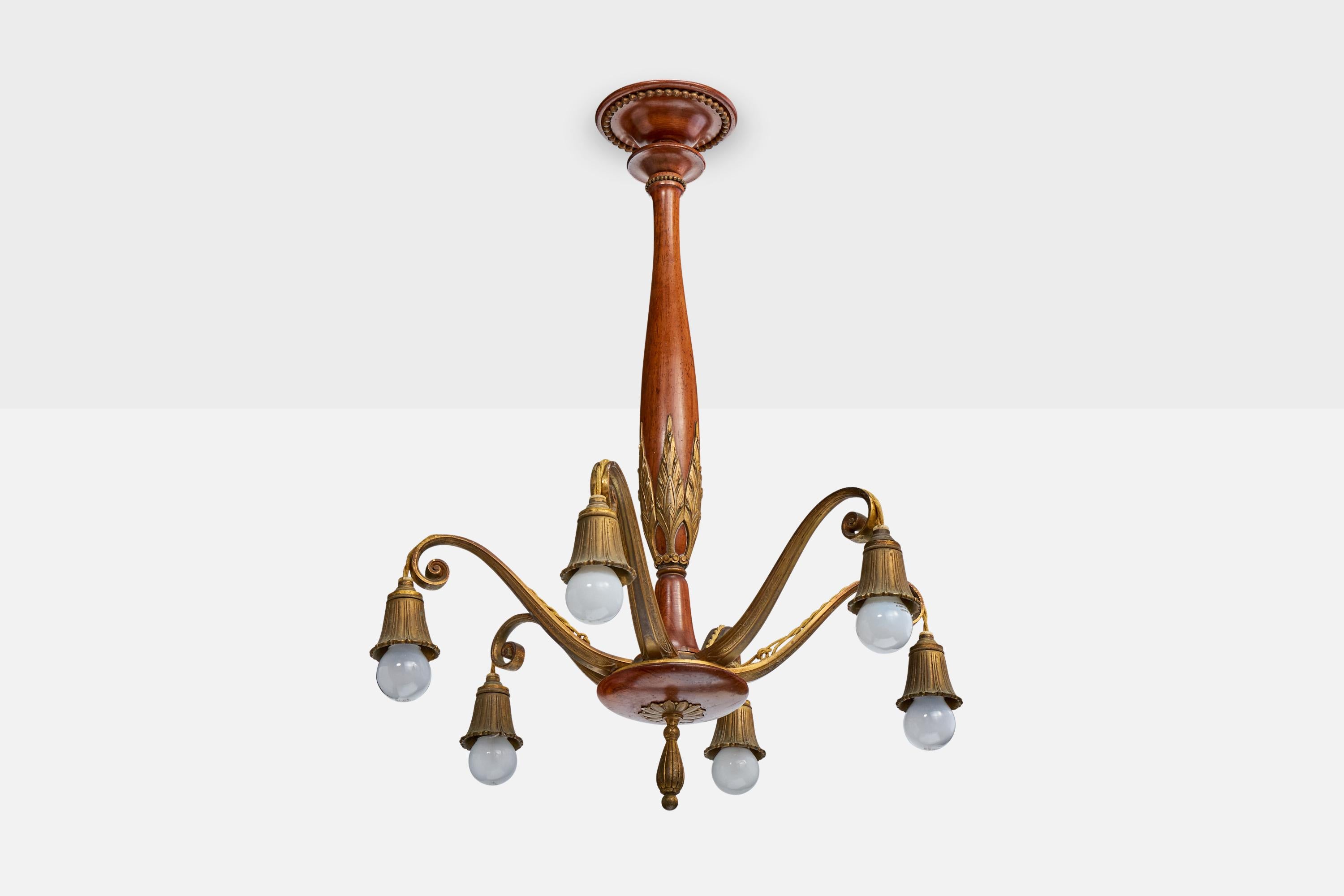 A wood and brass chandelier likely designed and produced in Austria, c. 1920s.

Overall Dimensions (inches): 27