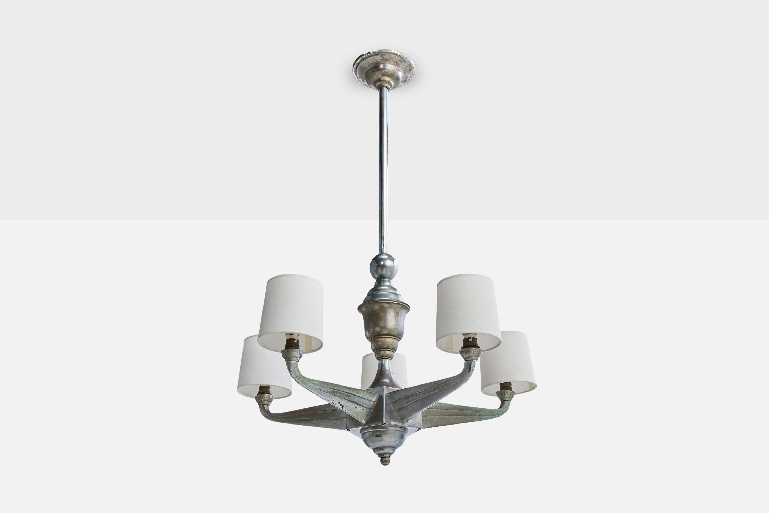 A metal and white fabric chandelier likely designed and produced in Austria, c. 1920s.

Significant oxidation present to metal

Wear consistent with age and use

Overall Dimensions (inches): 36.5