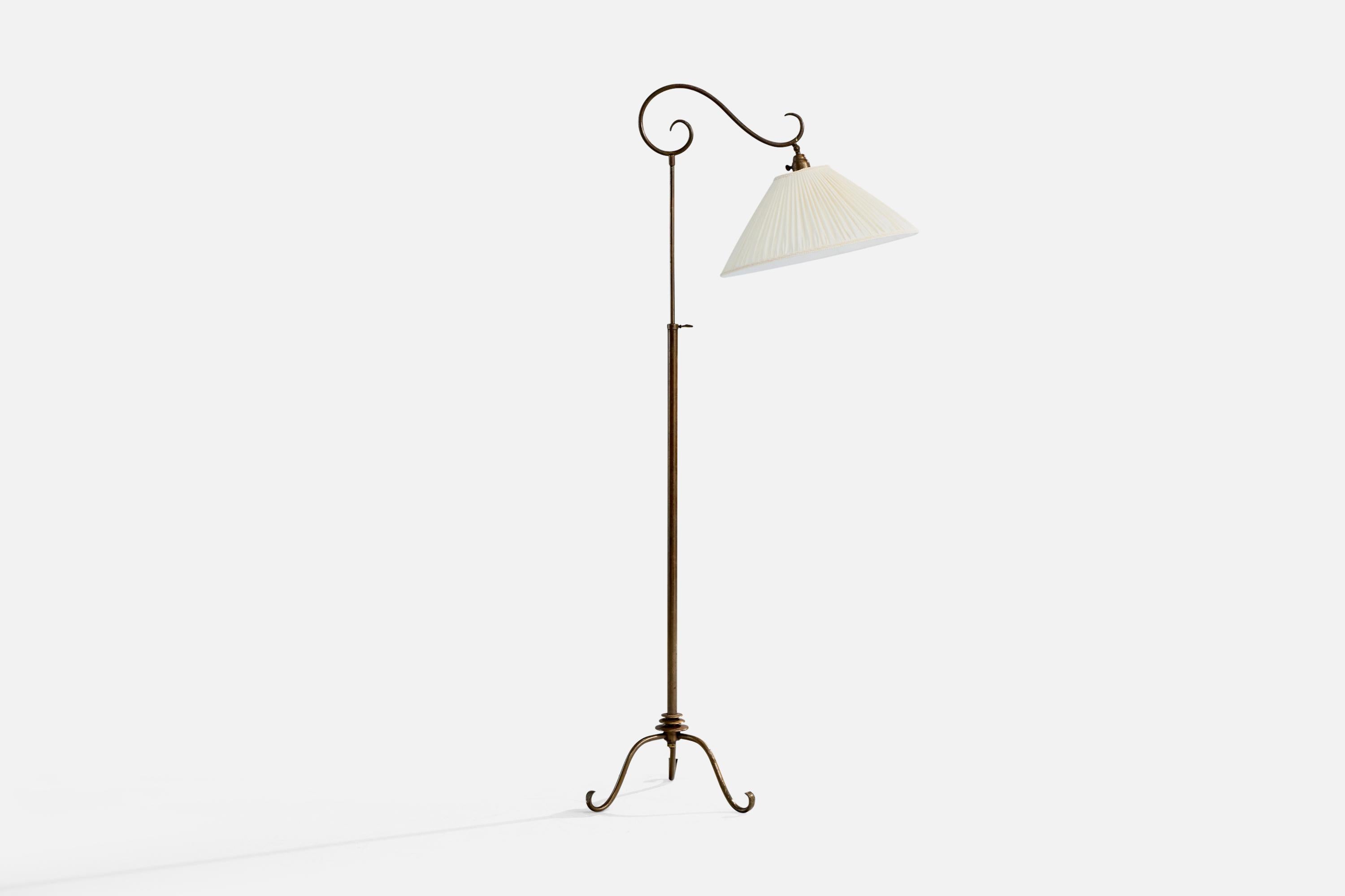 An adjustable bronze-colored brass and white fabric floor lamp likely designed and produced in Austria, c. 1930s.

Dramatic oxidation present, brand new lampshade.

Oxidation present to brass.

Wear consistent with age and use

Height and shade