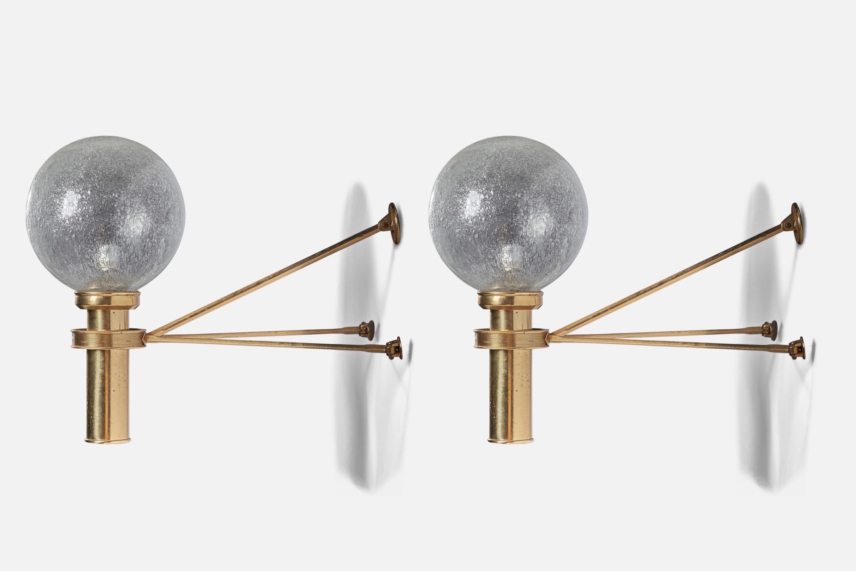 A pair of large brass and blown glass wall lights designed and produced in Austria, 1950s.

Overall Dimensions (inches): 20” H x 10” W x 24 D
Back Plate Dimensions (inches): 19” H x 15.5” W 
Bulb Specifications: E-26 Bulb
Number of Sockets: 1
All