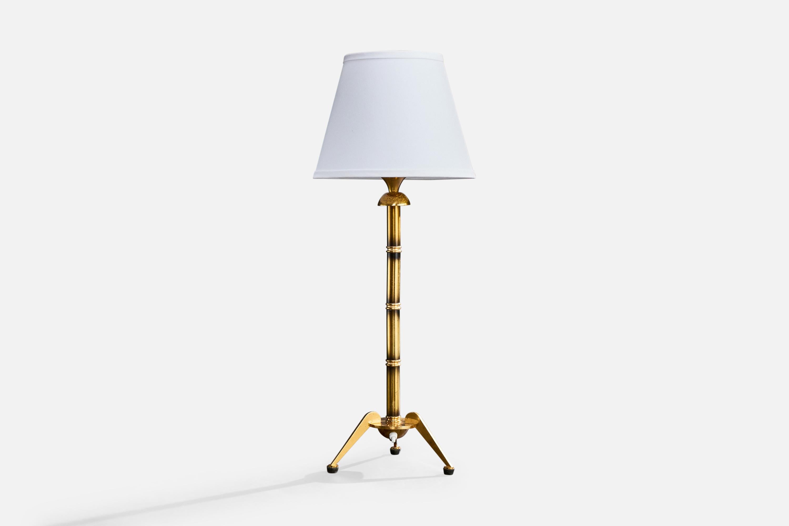 A brass table lamp likely designed and produced in Austria, c. 1930s.

Dimensions of Lamp (inches): 20.0” Height x 8.0” Diameter

Dimensions of Lamp with Shade (inches): 26.0