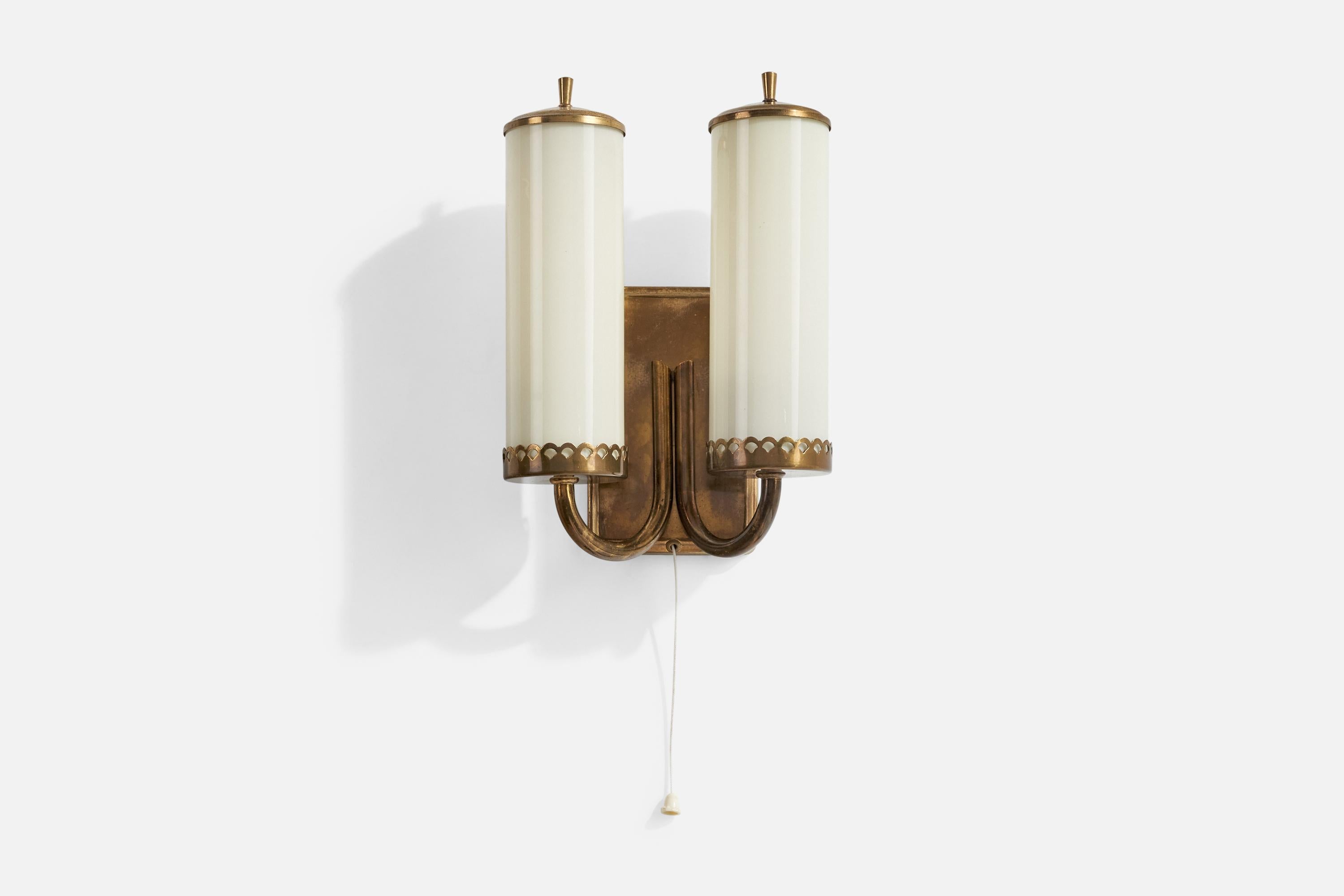 A two-armed brass and opaline glass wall light designed and produced in Austria, c. 1950s.

Overall Dimensions (Inches): 9.55” H x 6.1” W x 3.375“ D

Back Plate Dimensions (Inches): 5.2” H x 3.6“ W x .6” D

Bulb Specifications: E-14

Number of
