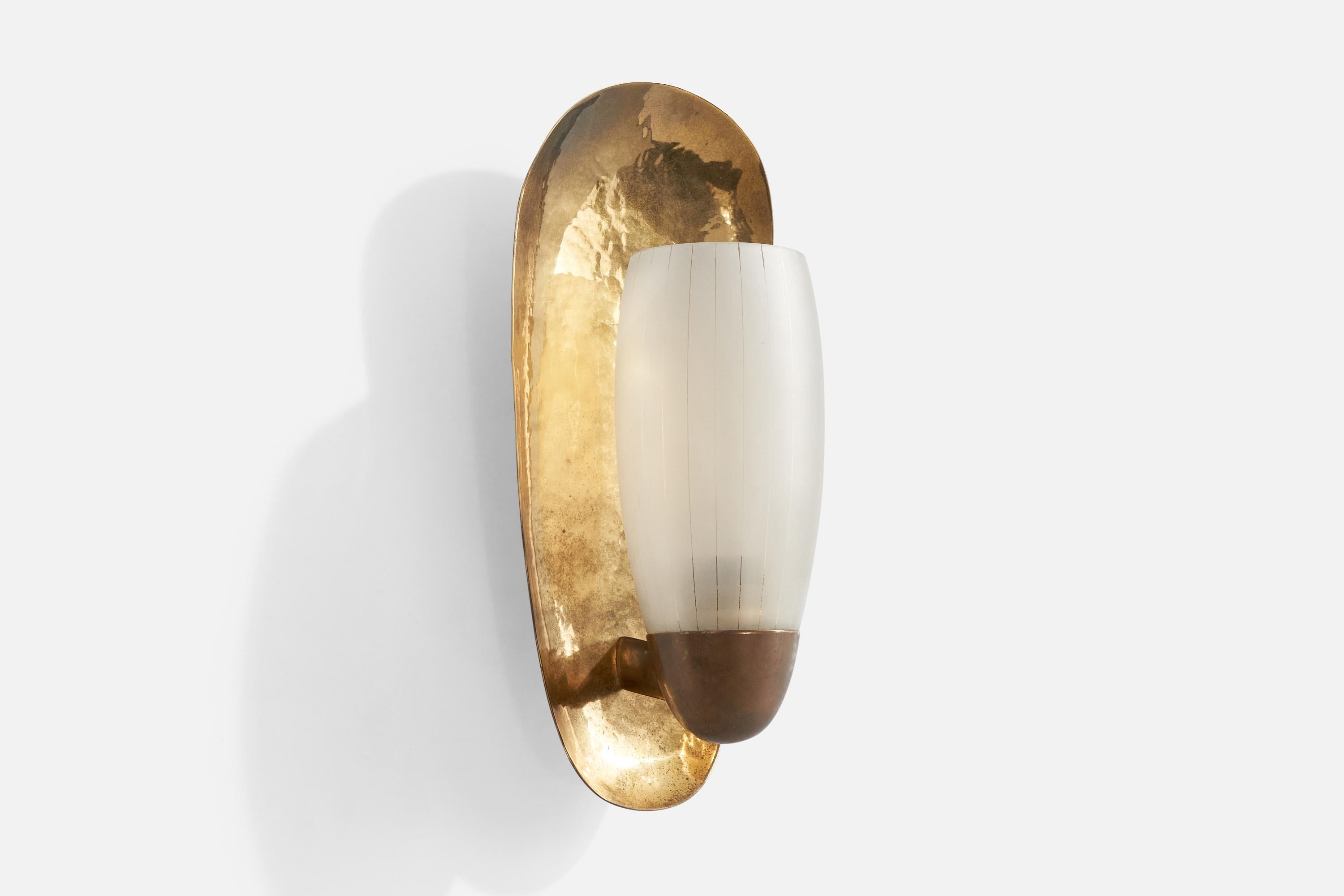A hammered brass and etched glass wall light designed and produced in Austria, c. 1950s.

The brass back piece and socket presents with moderate discoloration.

Overall Dimensions (Inches): 13.7” H x 6.4” W x 5.7” D

Back Plate Dimensions (Inches):