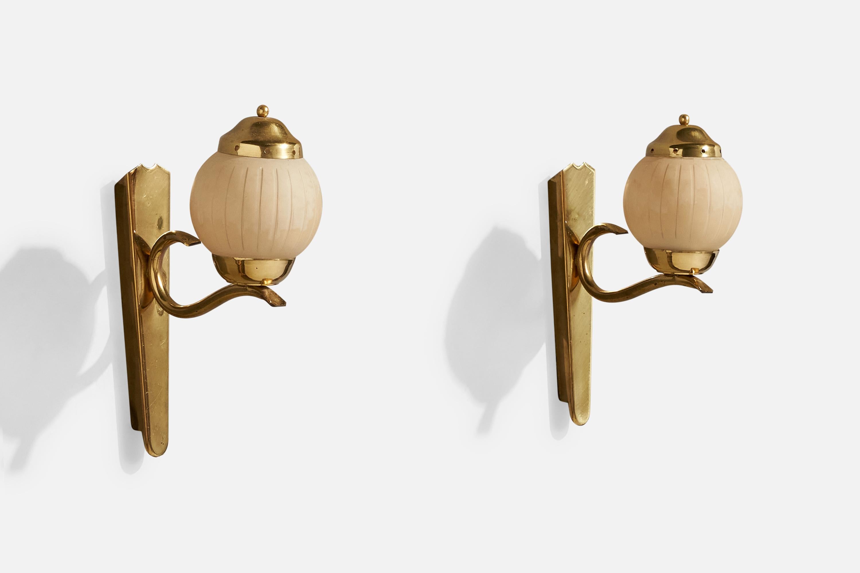 A pair of brass and light pink etched glass wall lights designed and produced in Austria, c. 1950s.

Overall Dimensions (Inches): 8.5” H x 3.125” W x 6.25“ D

Back Plate Dimensions (Inches): 7.5” H x 1.5“ W x .65” D

Bulb Specifications: E-14