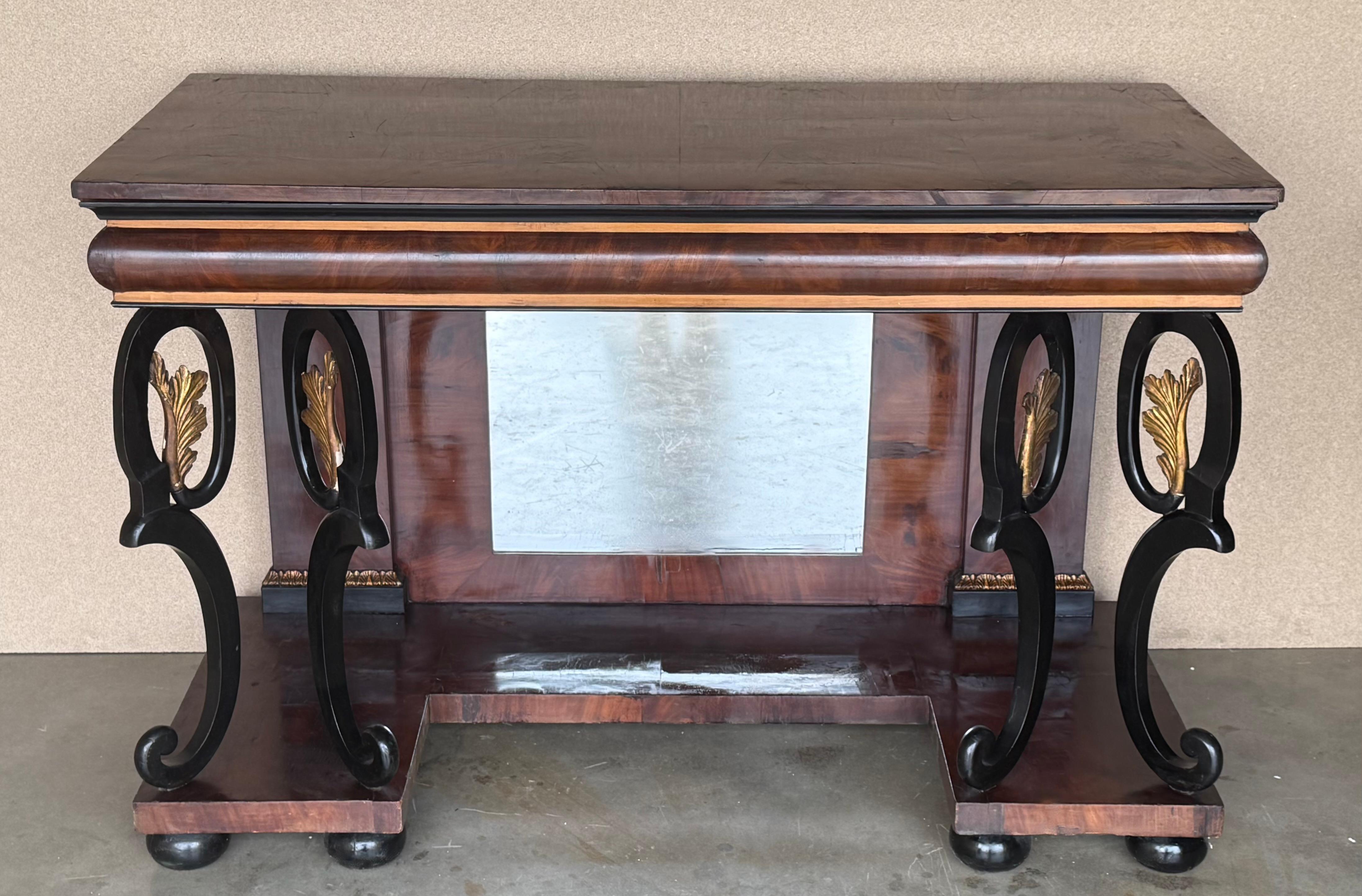 Austrian console table from the Karl Johan Period in walnut and ebonized wood. Drawer in frieze. The table is decorated with Swans that are painted in a gold color to imitate oxidized copped with gilded details. The swans are inspiration from the
