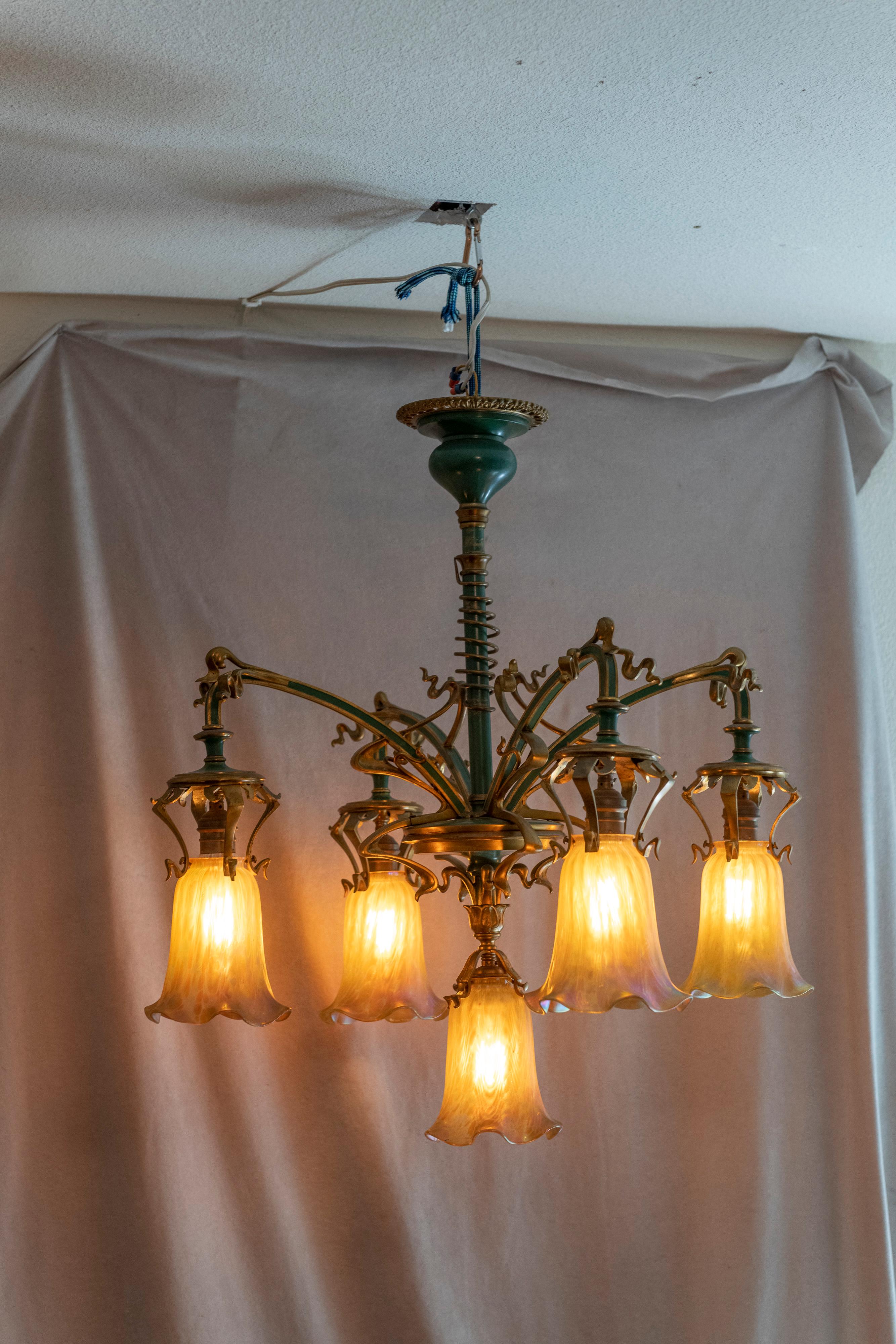 One of the finest Austrian chandeliers we have ever owned. We are saying that it has Art Nouveau influence as well Vienna Secessionist influence. It's got a lot going on for the typical Secessionist chandeliers, and that was our conundrum.It took us