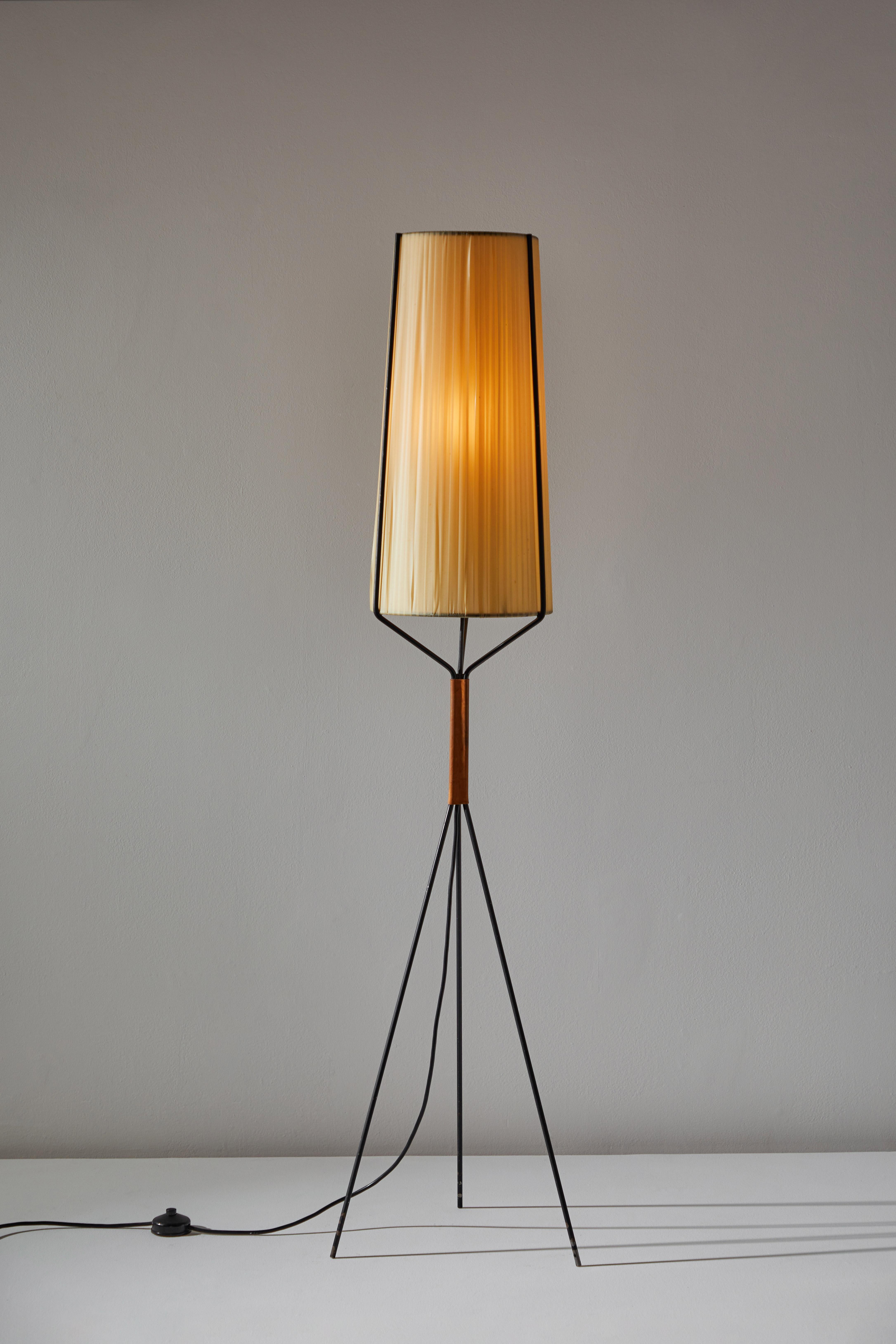 Floor lamp. Designed and manufactured in Austria, circa 1950s. Iron, leather, woven ribbon shade. Original cord with step switch. We recommend one E27 60w maximum bulb. Bulbs provided as a one time courtesy.