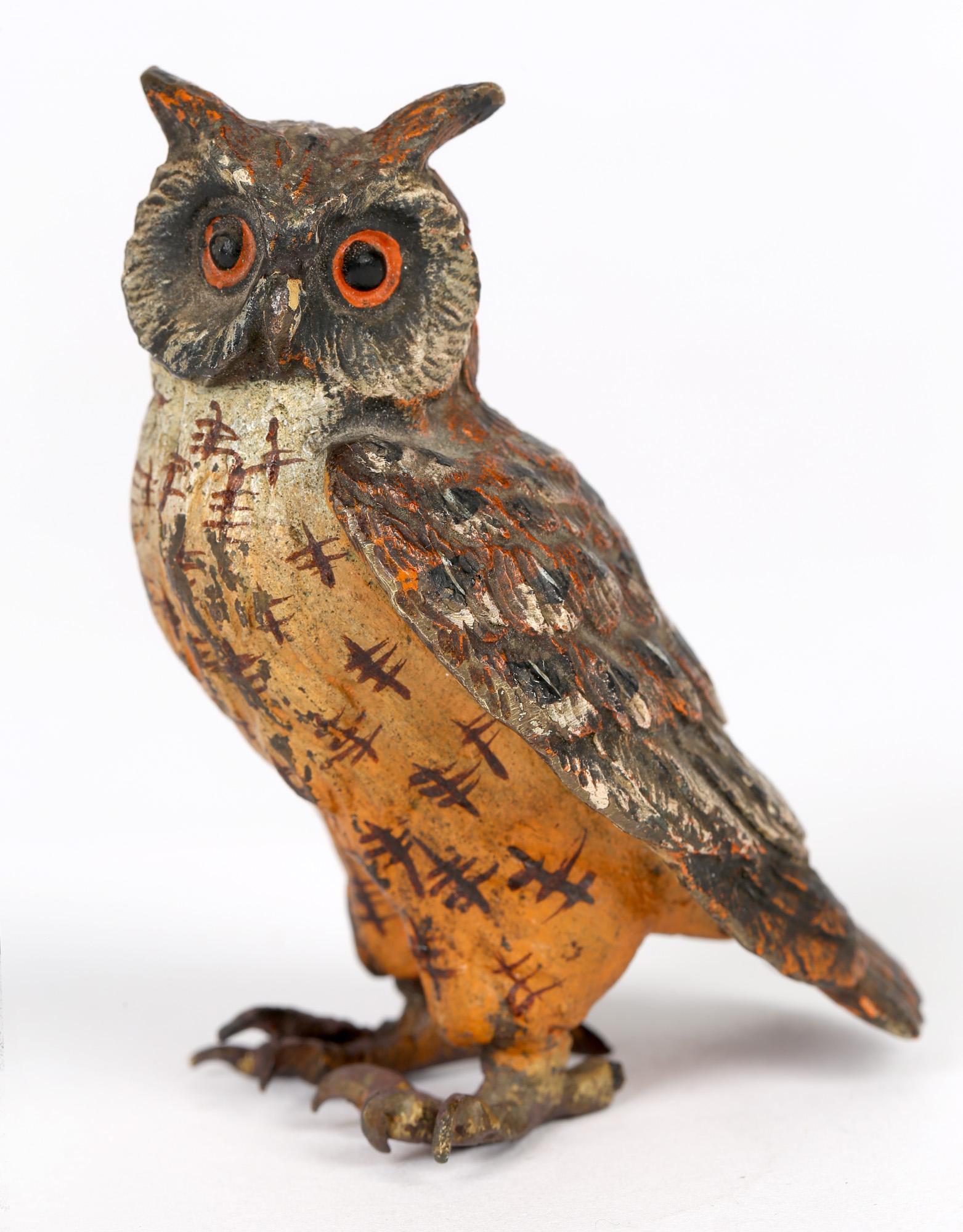 A very well made Austrian Vienna cold painted bronze figure of an owl attributed to Franz Bergman and dating from around 1900. The owl stands glancing sideways and is very well hand decorated in naturalistic colors and detail with large black and