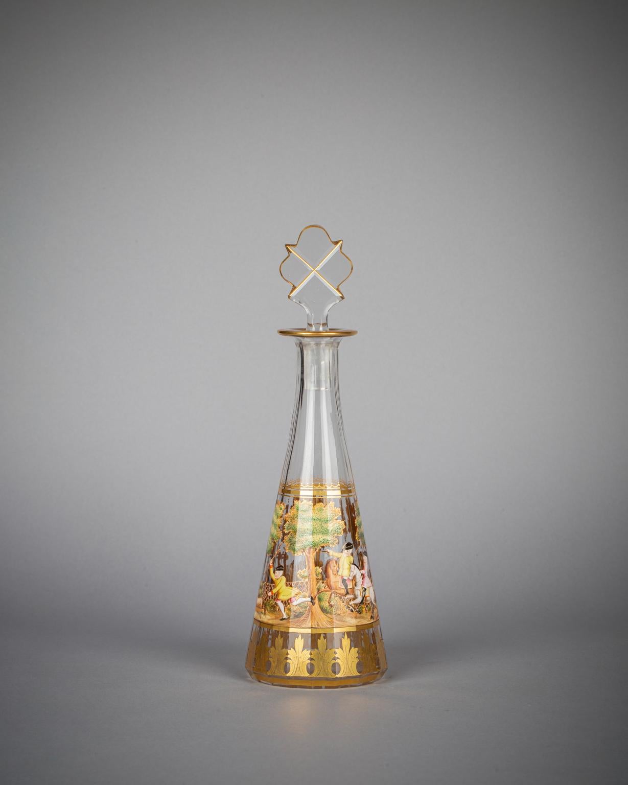 Liqueur decanter and stopper and six glasses enameled with hunting scenes. 
The dimensions of the glass: Height 3