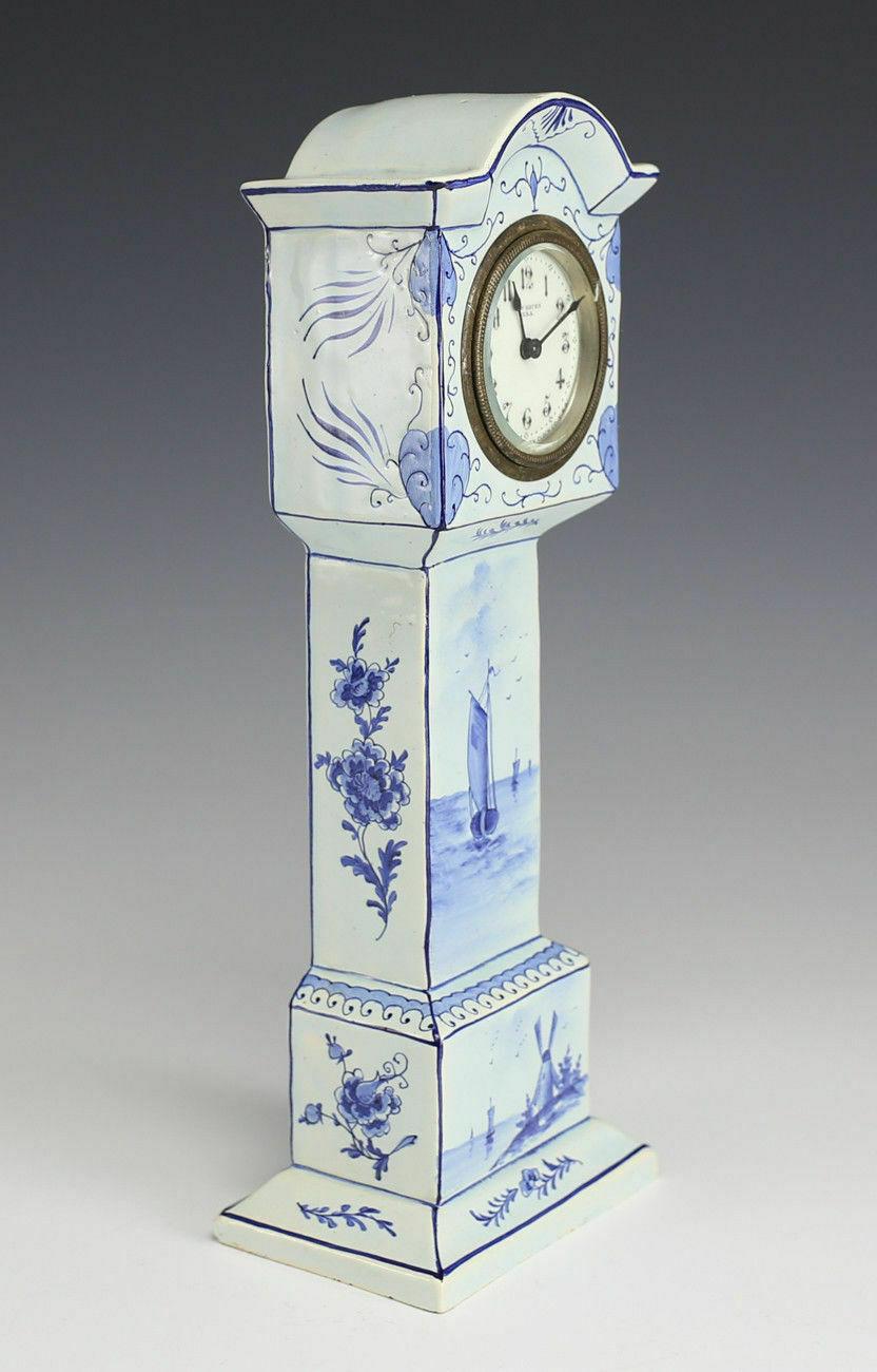 Hand Painted Austrian Porcelain miniature tall clock case - Movement Manufactured by New Haven Clock Co., USA. C1900

Additional information:
Time Period Manufactured: 1900-1919 
Primary Material: Ceramic & Porcelain
Material: Porcelain