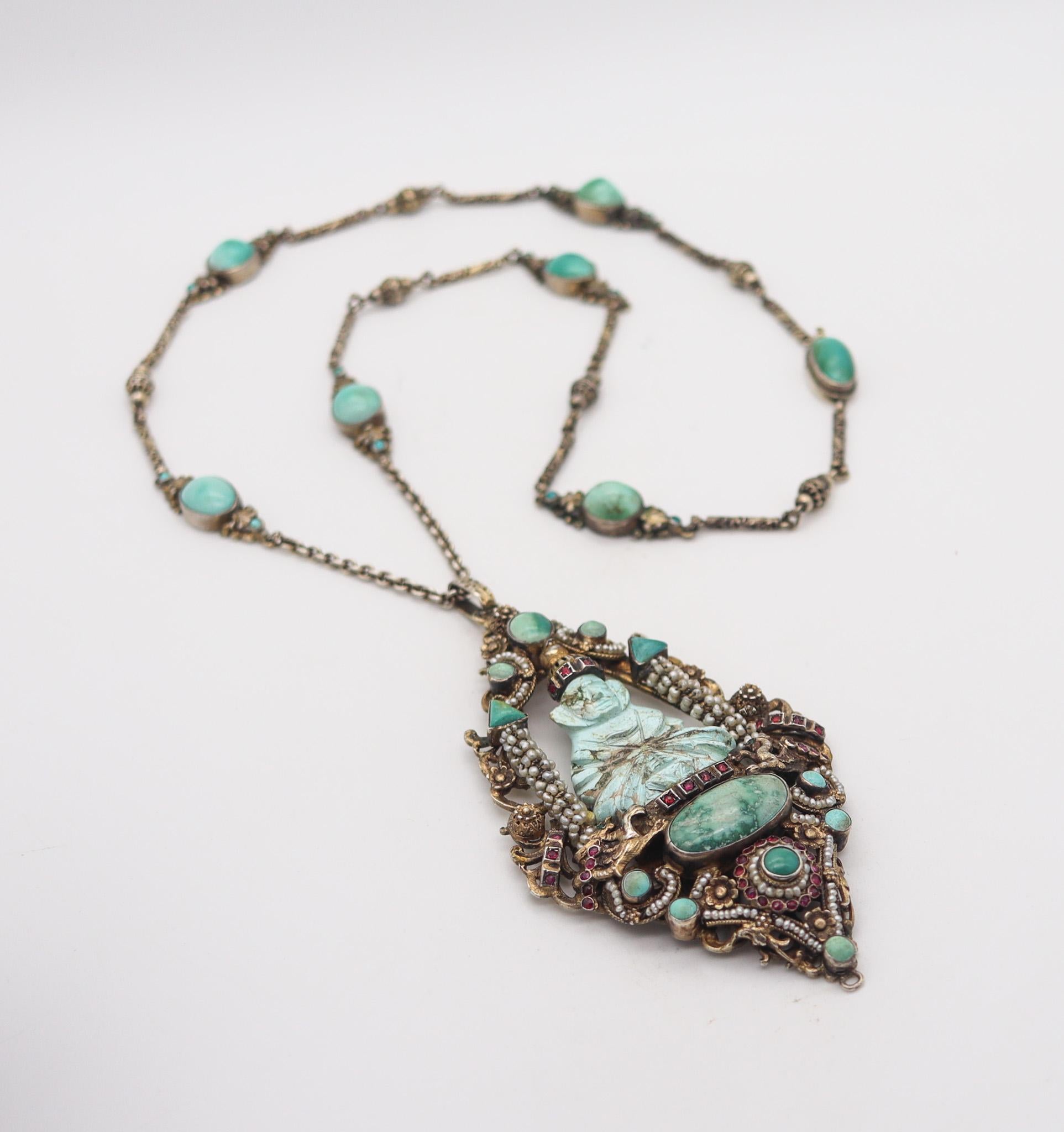 An Austrian-Hungarian orientalism pendant sautoir with turquoises.

This beautiful and extraordinary pendant necklace-sautoir is one of the best example we have ever seen of Austrian-Hungarian empire jewelry. It was crafted in the turn of the