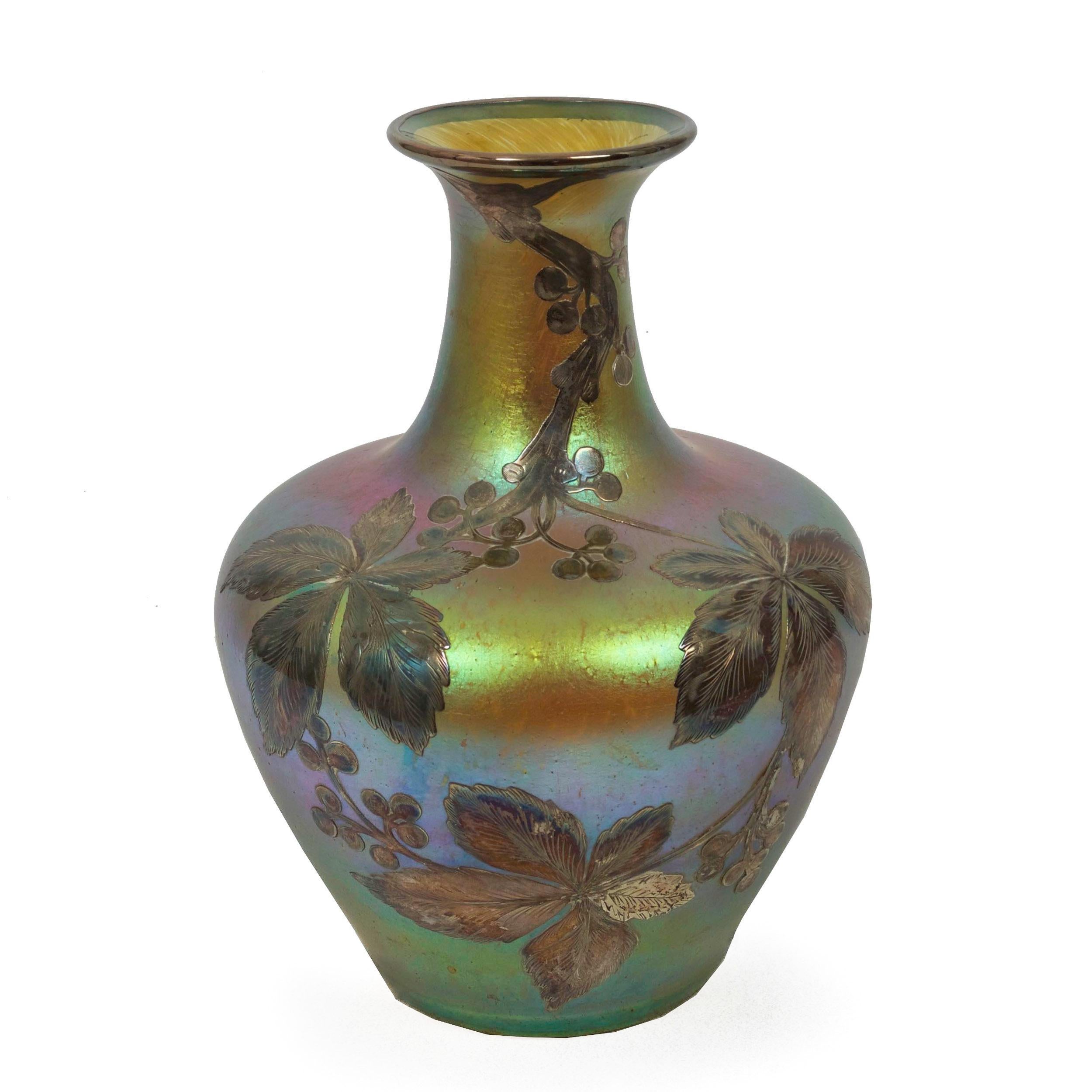 AUSTRIAN IRIDESCENT GOLD, BLUE AND GREEN GLASS VASE WITH SILVER OVERLAY
