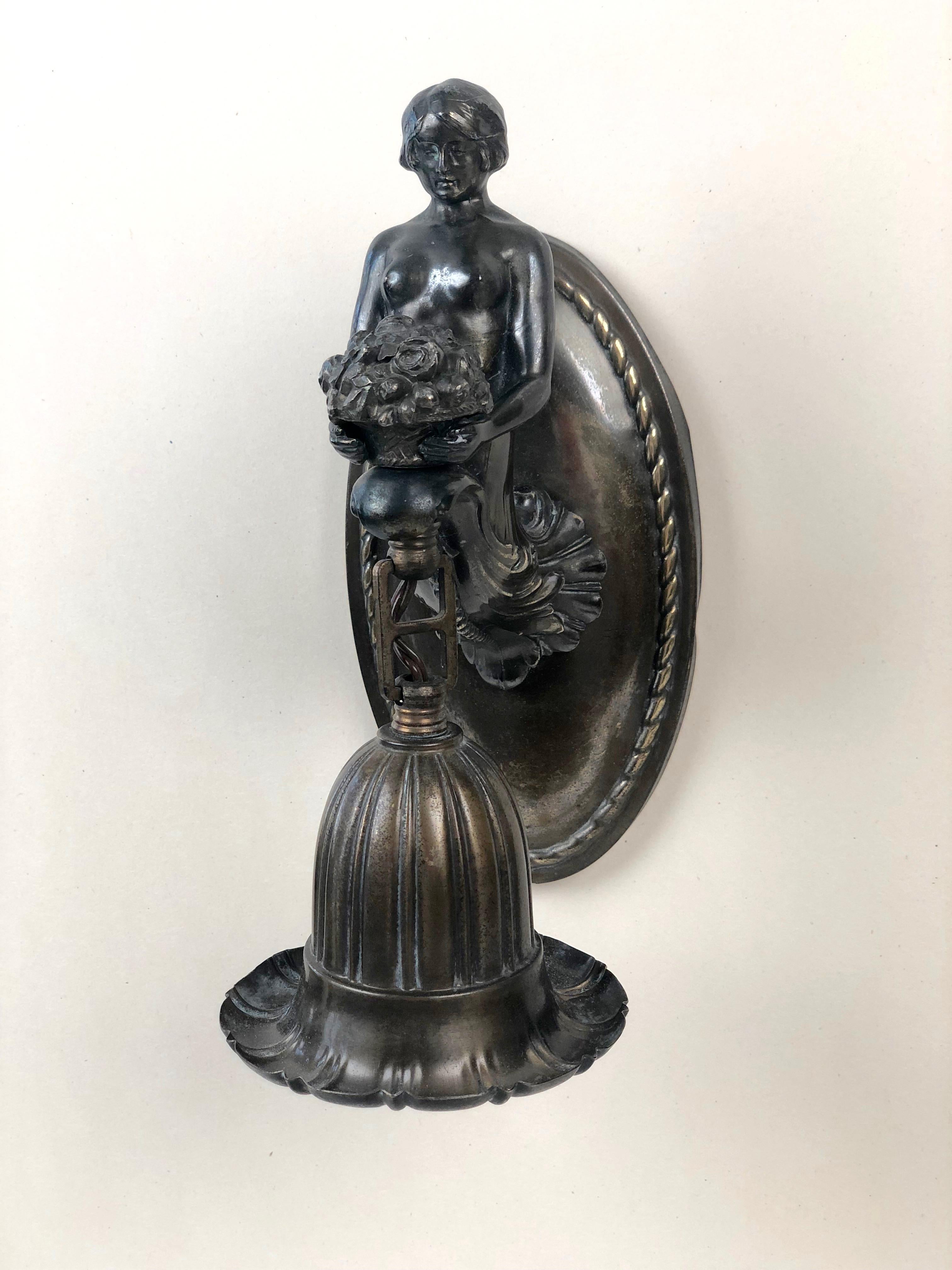 Early 20th Century Austrian Jugendstil Bronze Wall Sconce with a Torso of a Women Holding a Bouquet For Sale