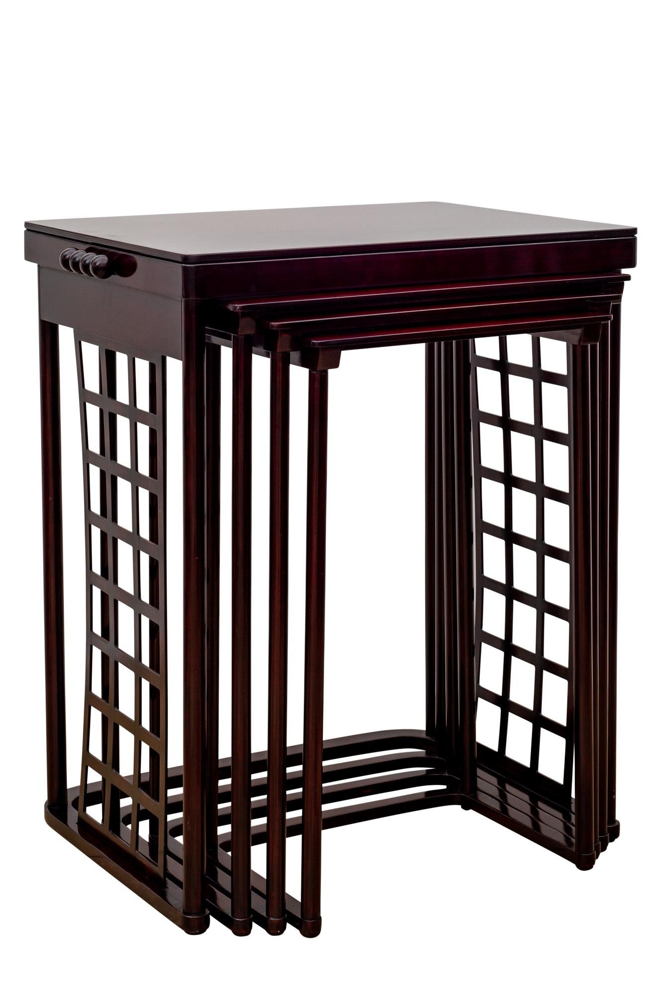 Austrian Jugendstil Nesting Tables with Grid designed by Josef Hoffmann 1905 polished and stained Beechwood - manufactured by Jacob & Josef Kohn model no.988

1905 was one of the most important years for the Wiener Werkstatte. The two designers