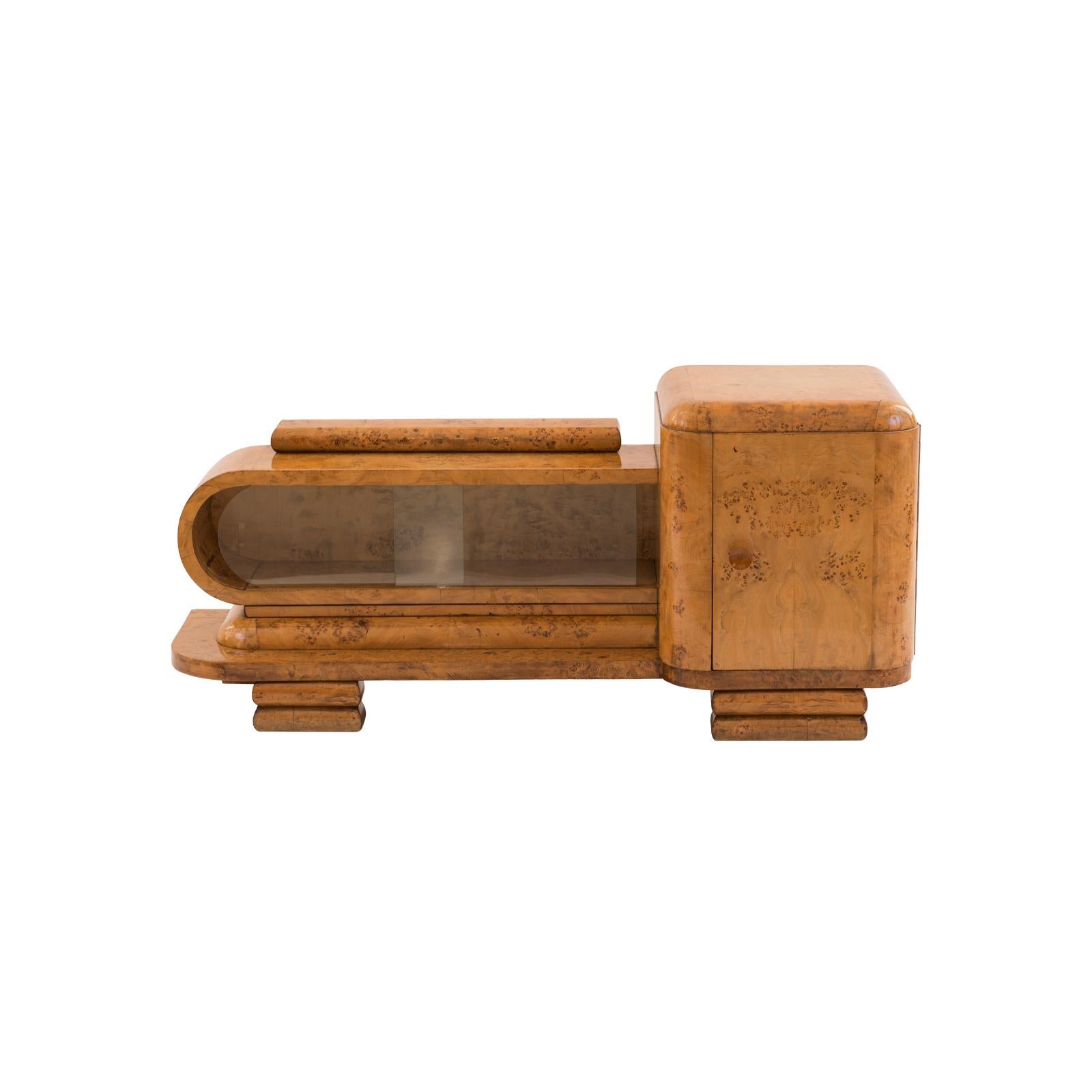Delicate and elegant sideboard, veneered with a wonderful textured walnut.