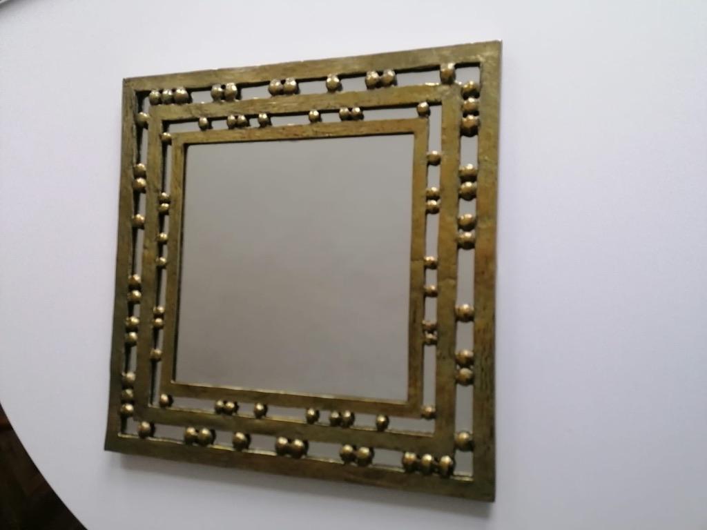 Square shaped brass frame with a mirror. Made in Austria in the 1970s.