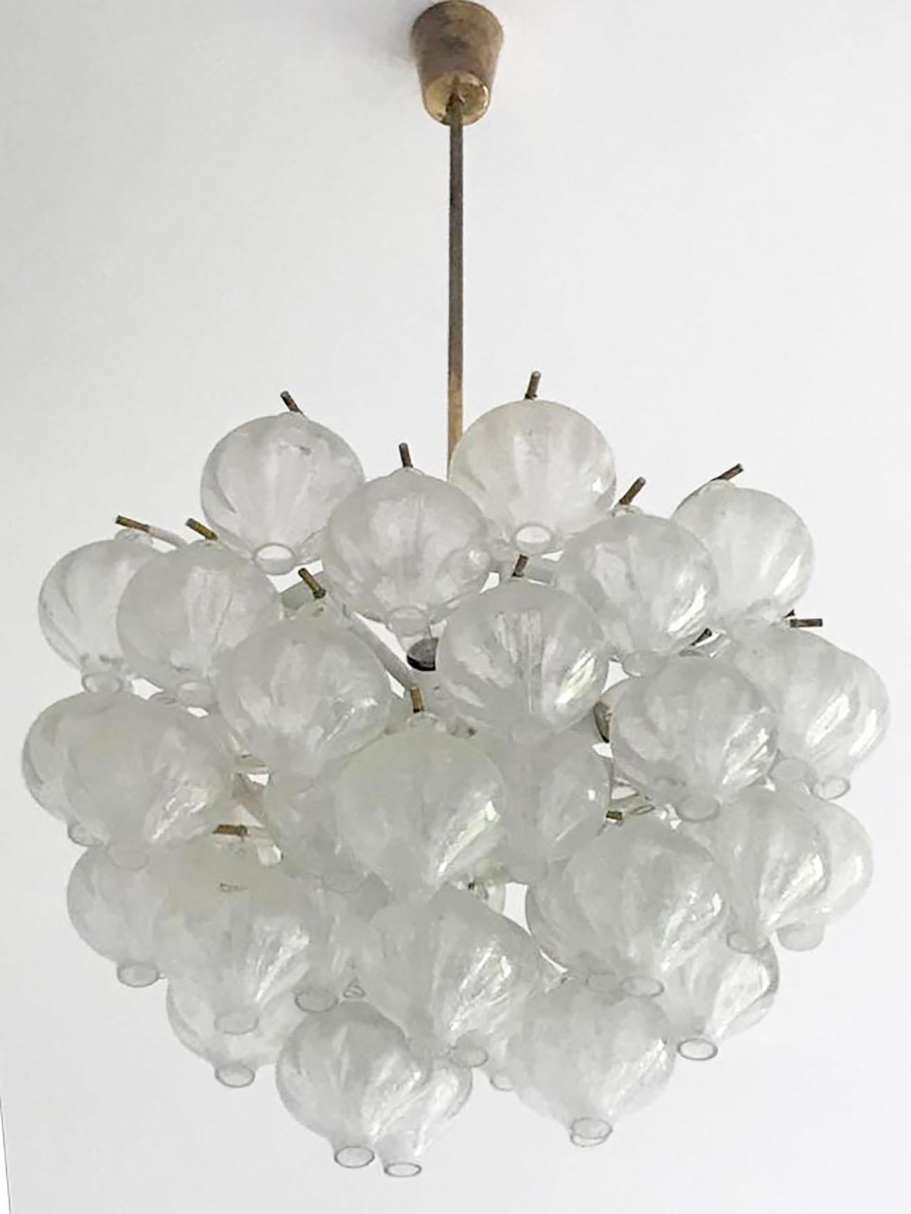 This Fantastic Austrian Mid-Century Modern Kalmar Tulipan chandelier or Pendant Lamp has been designed by J.T. Kalmar for Kalmar Vienna in the 1960s and consists of numerous blown tulipan glass elements which are highly saturated with tiny air
