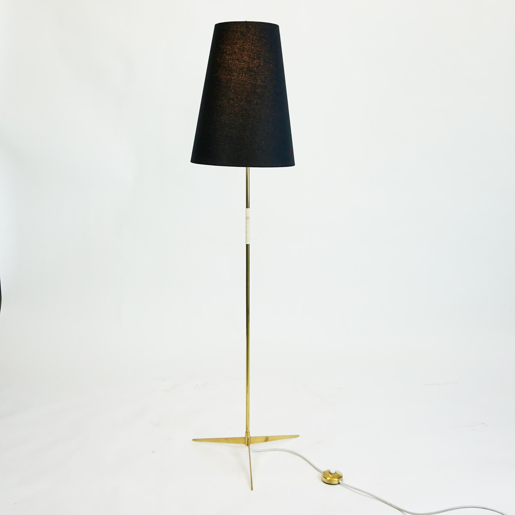 Iconic Austrian midcentury brass floor lamp called Micheline, designed by Julius Theodor Kalmar for Kalmar, Mod. No 2092 as shown in the Kalmar Sales catalogue 1960, manufactured in Austria, circa 1955. This lamp is a rare version completely in