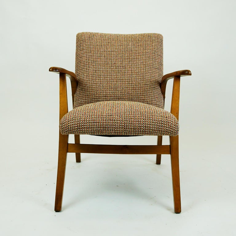 Charming Austrian mid-century bright beechwood armchair with new top quality fabric upholstery in orange, red, beige and brown tones , designed for Café Ritter in Vienna in 1952, one of the most popular designs by Roland Rainer. They have been
