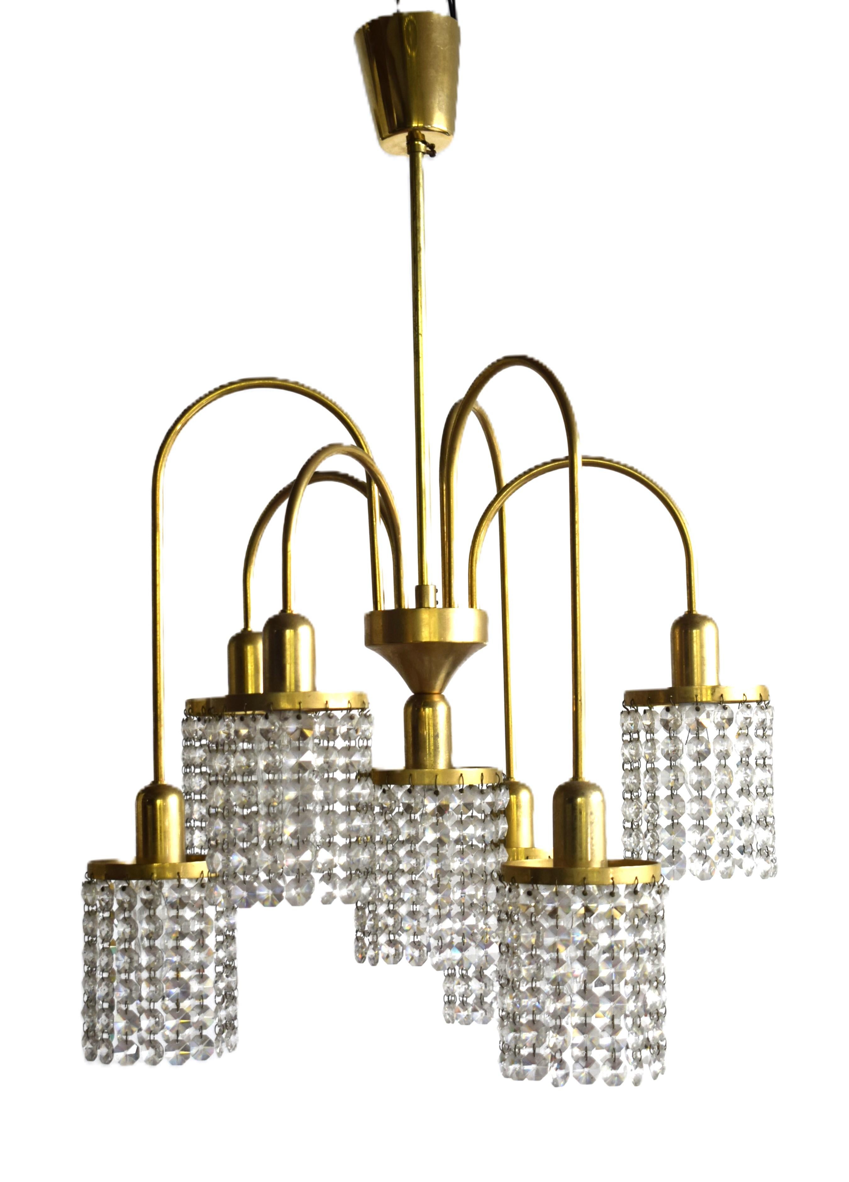 Very elegant crystal lamp; made in Austria.
7 arms with E14 sockets.