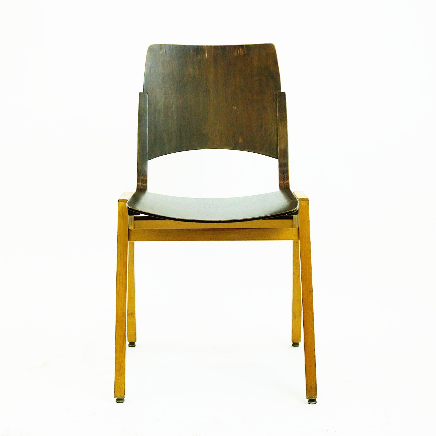 Austrian midcentury beechwood stacking chair designed by Roland Rainer in 1952, same time as the famous model called Stadthallenstuhl. The model P7 has been also used at the Vienna Stadthalle, mostly in the backstage areas. One of the most important