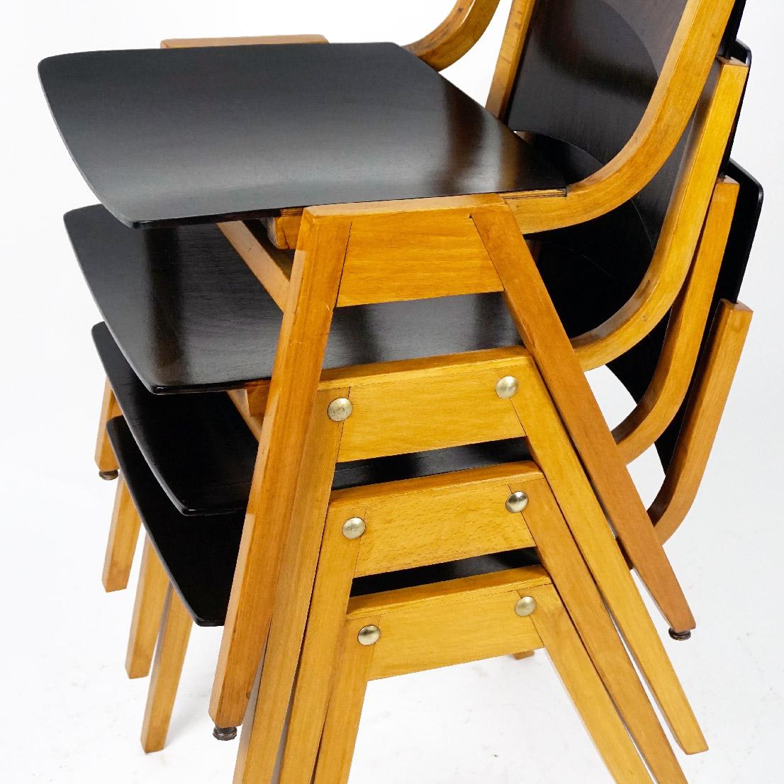 Austrian midcentury beechwood stacking chairs designed by Roland Rainer in 1952, same time as the famous model called Stadthallenstuhl. The model P7 has been also used at the Vienna Stadthalle, mostly in the backstage areas. One of the most