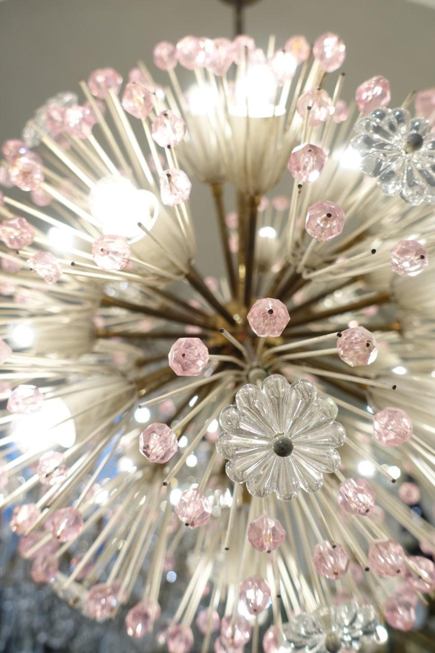 Large and gorgeous vintage ceiling light, from Austria. Brass framed and countless palest pink glass rosettes. This stunner’s snowball / Dandelion ‘pusteblum’ style was formed by Emil Stejnar for Rupert Nikoll back in 1955. Originally designed for
