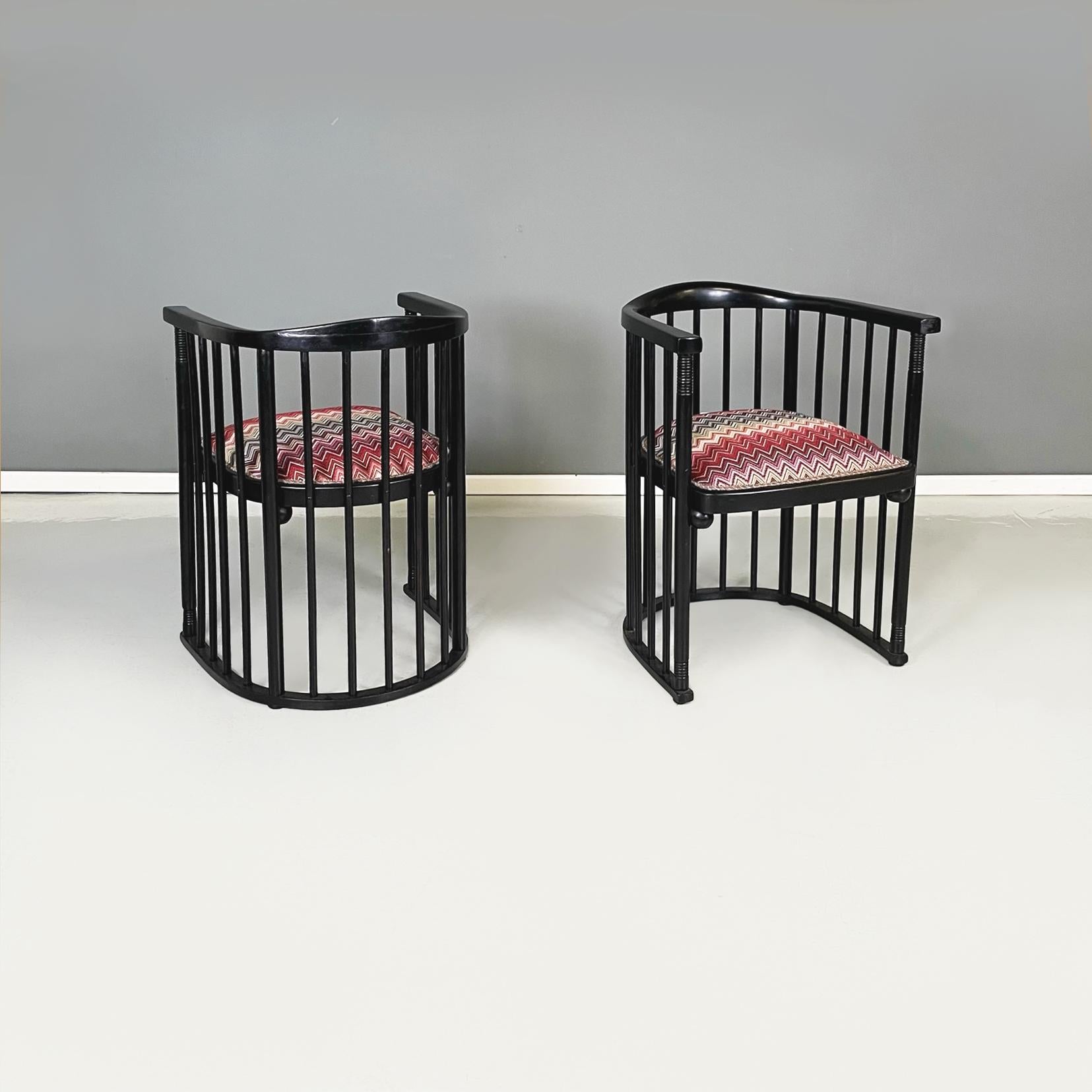 Austrian mid-century Missoni fabric black wood Tub chairs by Joseph Hoffmann, 1950s
Pair of tub chairs with semi-round padded seat upholstered in Missoni fabric. The seat is upholstered in a colored zig zag patterned fabric. The structure is made up