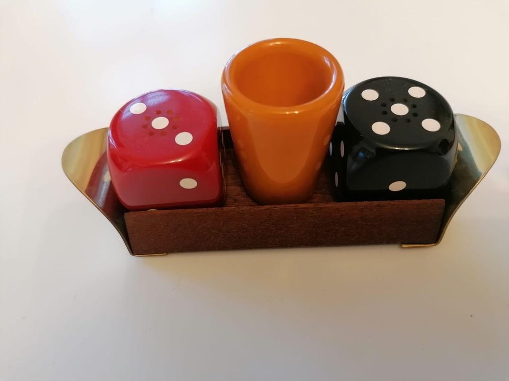 A set of consisting of salt and pepper shakers and a toothpicks stand on a nutwood brass plate. Designed by Erich Kolbenheyer in Autria in the 1960s.