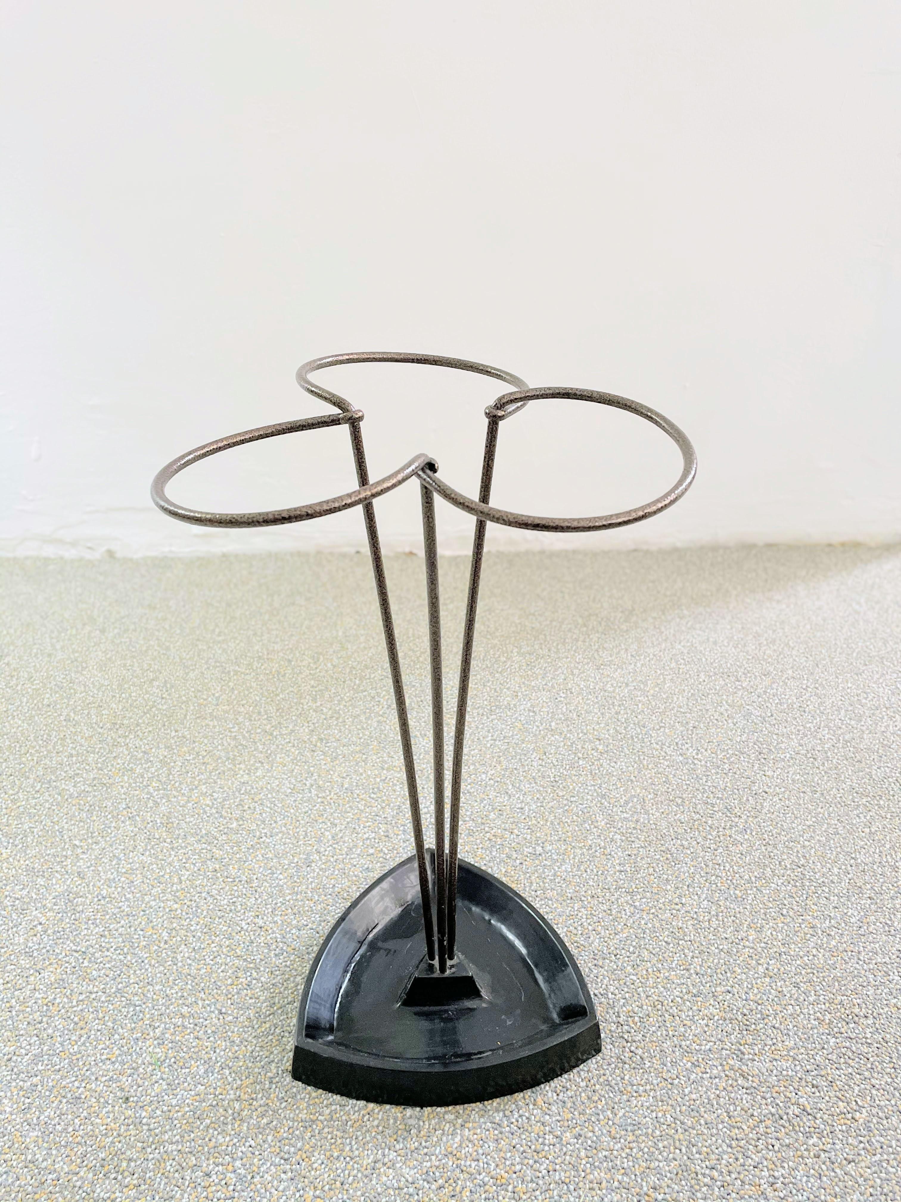 This elegant vintage midcentury umbrella stand was designed and manufactured in Austria in the 1950s.
 
   