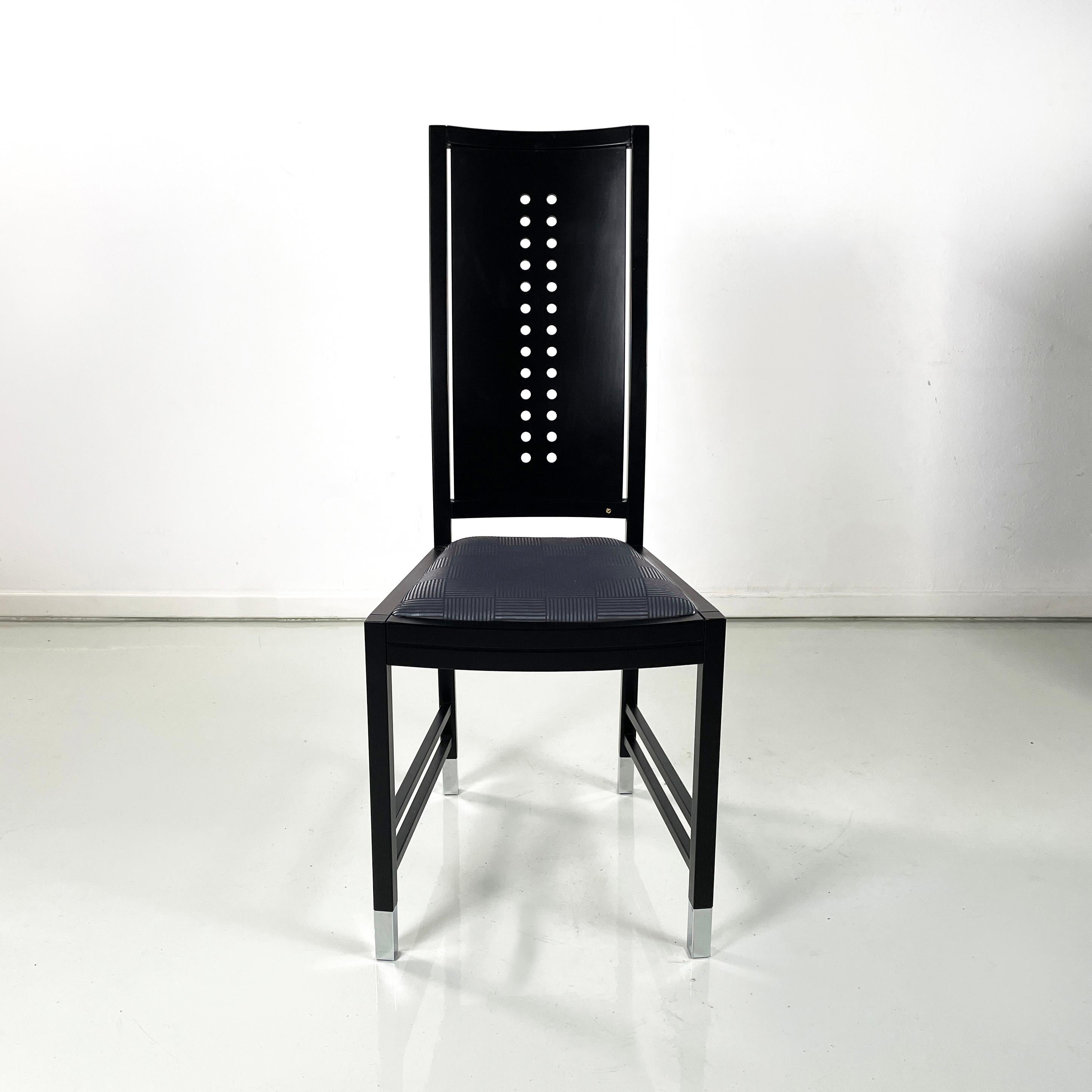 Austrian modern Chairs in black wood by Ernst W. Beranek for Thonet, 1990s
Set of three chairs with square seat, padded and covered in black fabric with silver geometric pattern. Structure in black lacquered wood with matt finish. The backrest is
