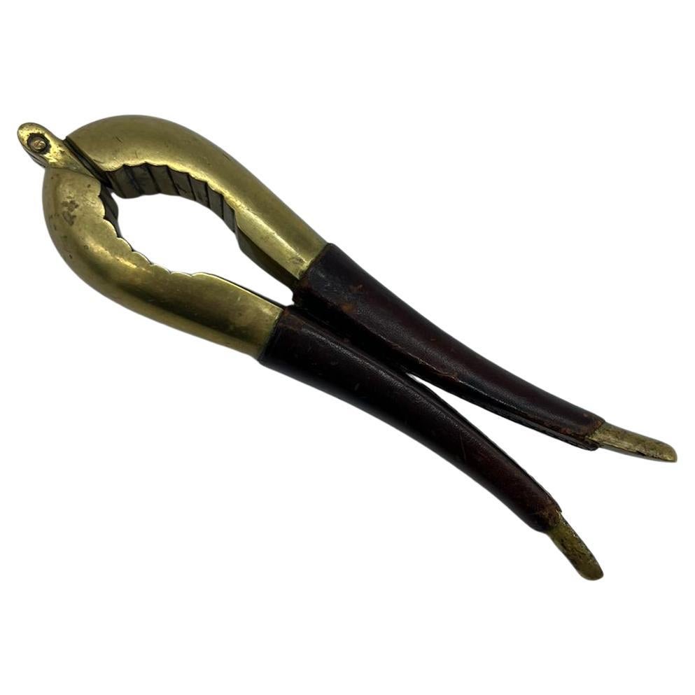 Austrian nutcracker by Carl Auböck made of leather & brass