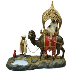 Retro Austrian Orientalist Cold Painted Spelter Man and Camel Watering Hole Table Lamp