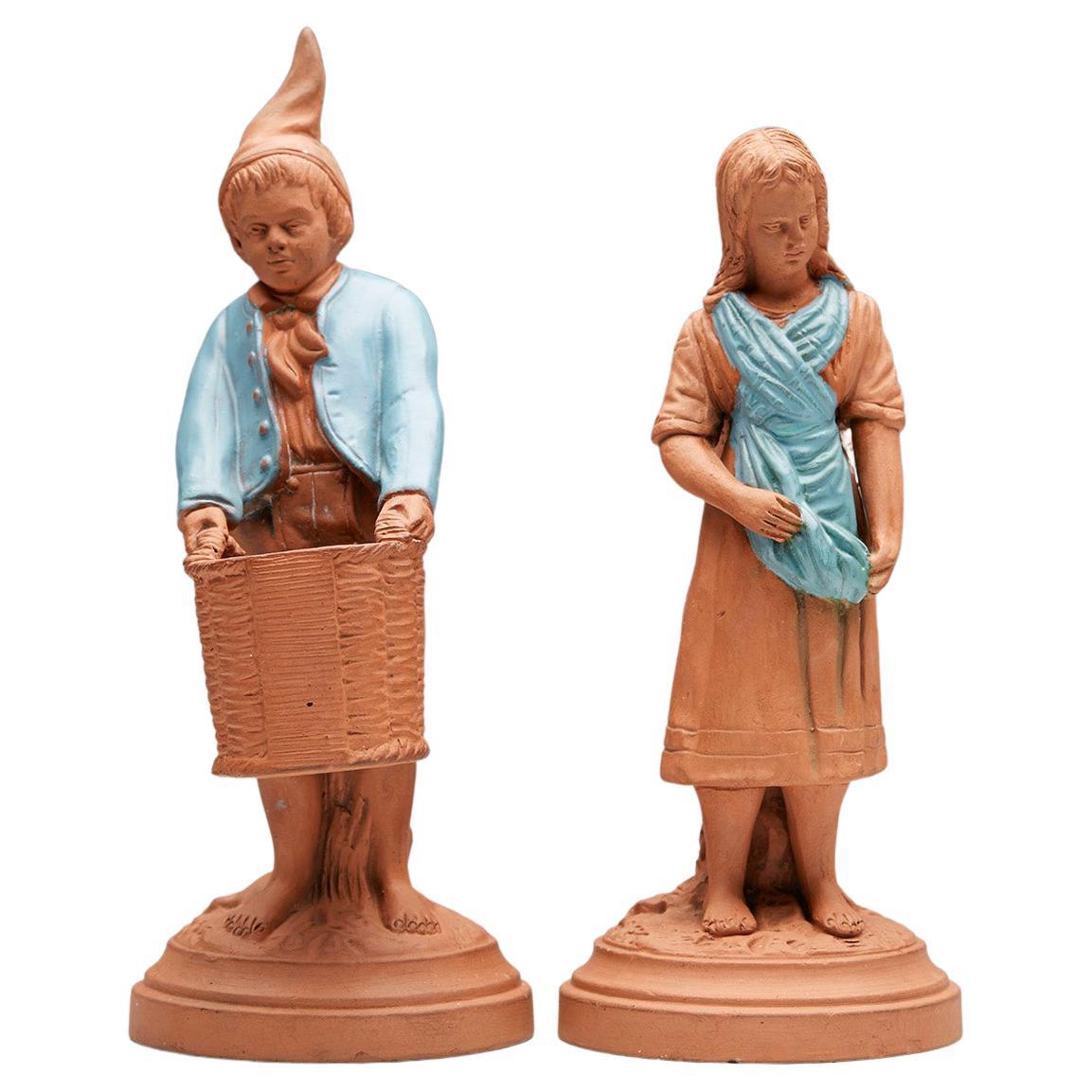 Österreichisches Paar antiker Terrakotta-Streichholzhalter-Figuren