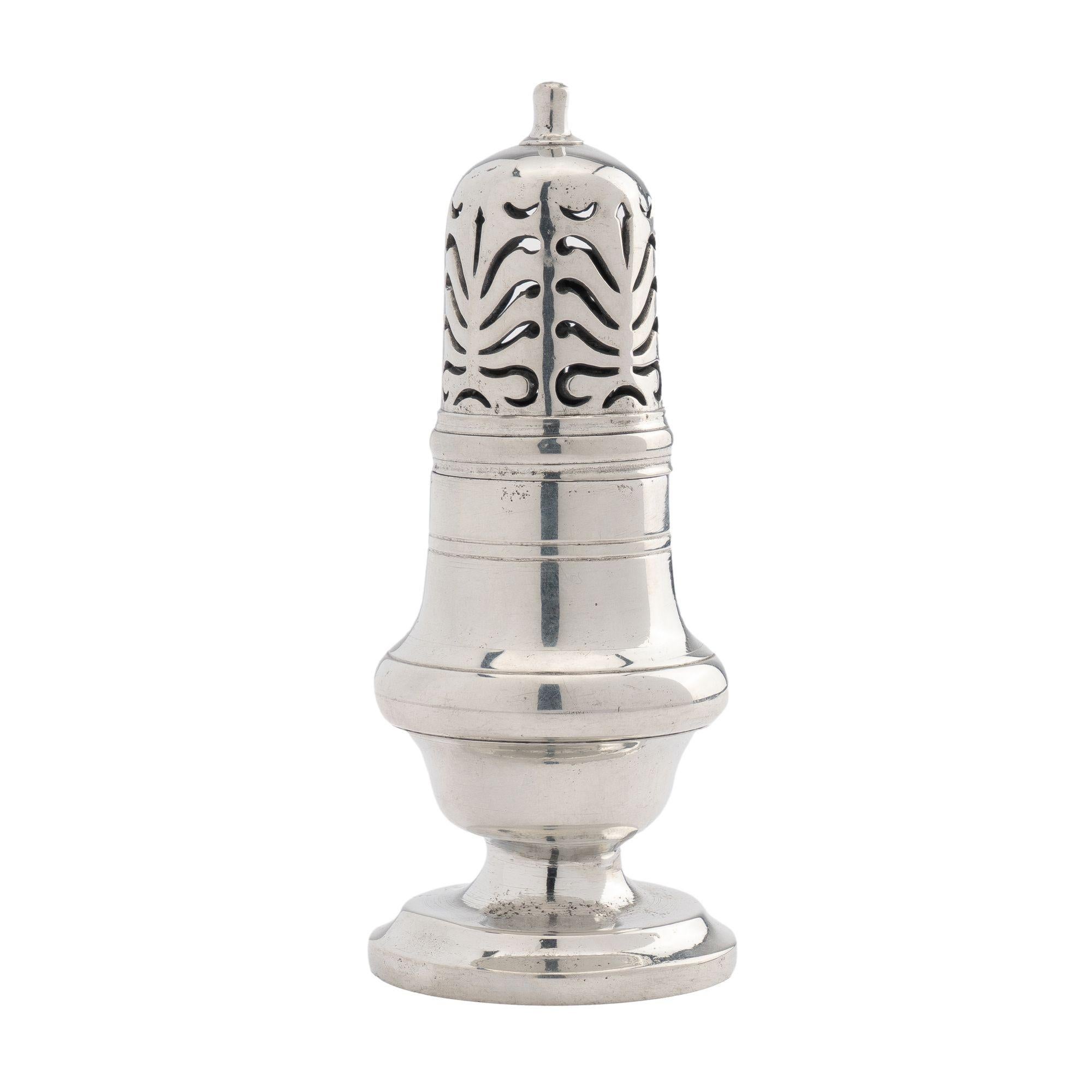 Polished pear shaped pewter sugar castor with Neoclassic anthemion piercing on the threaded top. The castor rests on a circular foot with angel impressed touch mark on the under foot.

Austria, circa 1830.