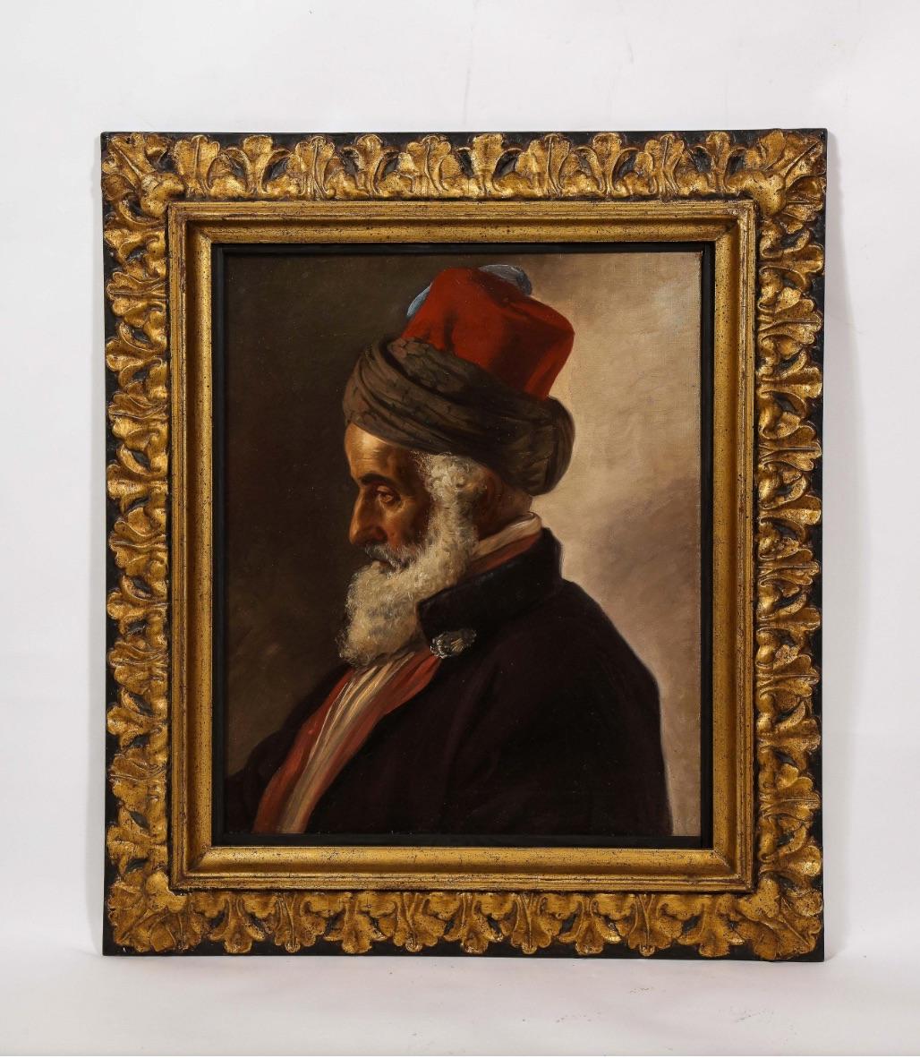 Austrian School, 19th century, An Orientalist Portrait of a Turkish Sultan.

Oil on Canvas, a very high quality painting, realistically painted of a Turkish Sultan, with a beard and traditional hat. In a giltwood frame.

Unsigned.

Canvas