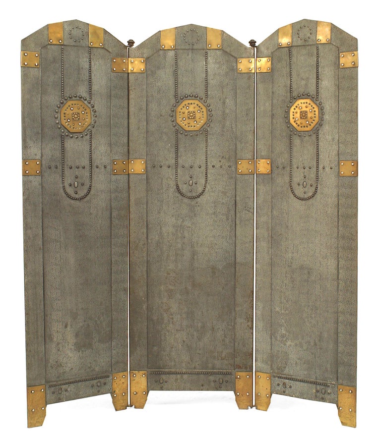 Austrian Secessionist tole painted 3 panel fire screen with nail head design and trimmed with small brass panels.
