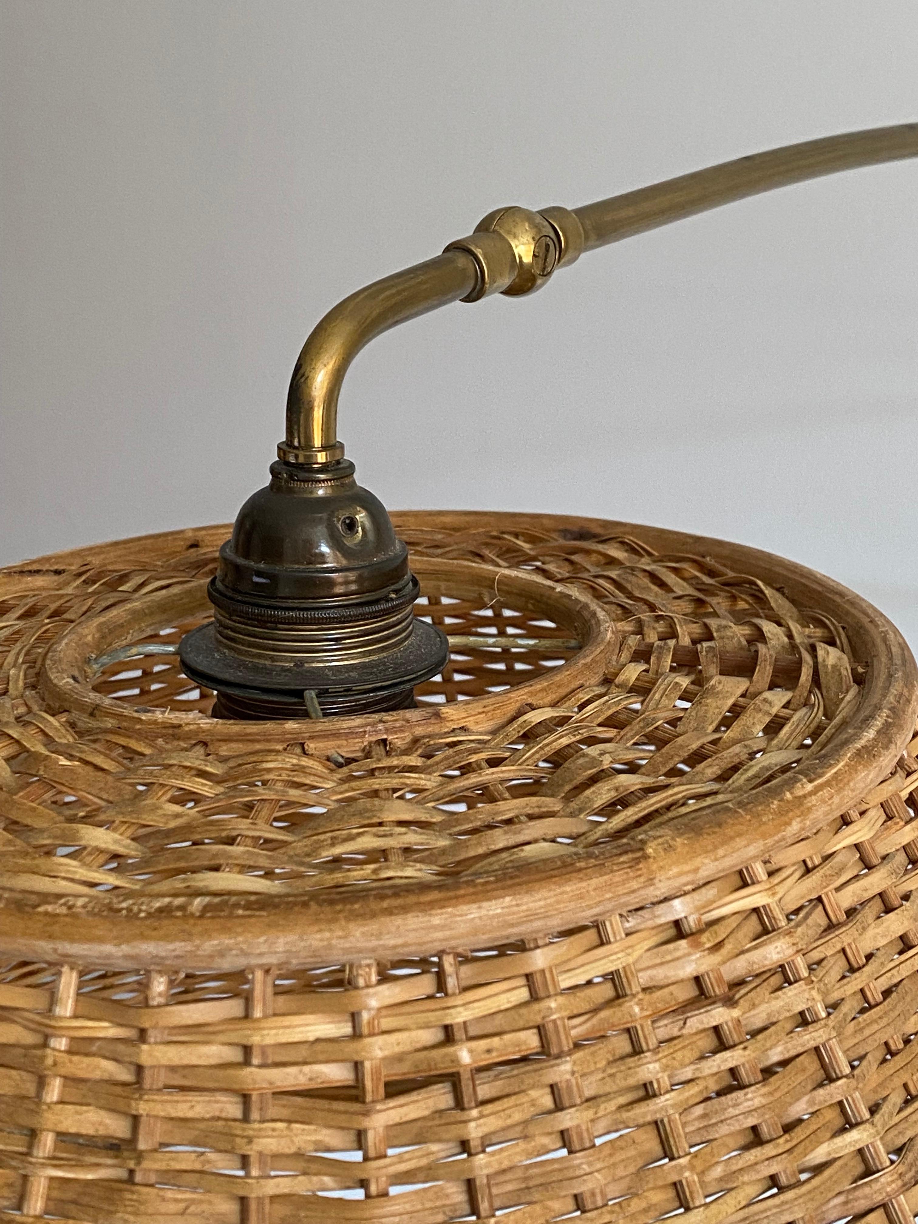 Austrian, Sizable Adjustable Wall Light, Brass, Rattan, Austria, c. 1950s In Good Condition In High Point, NC