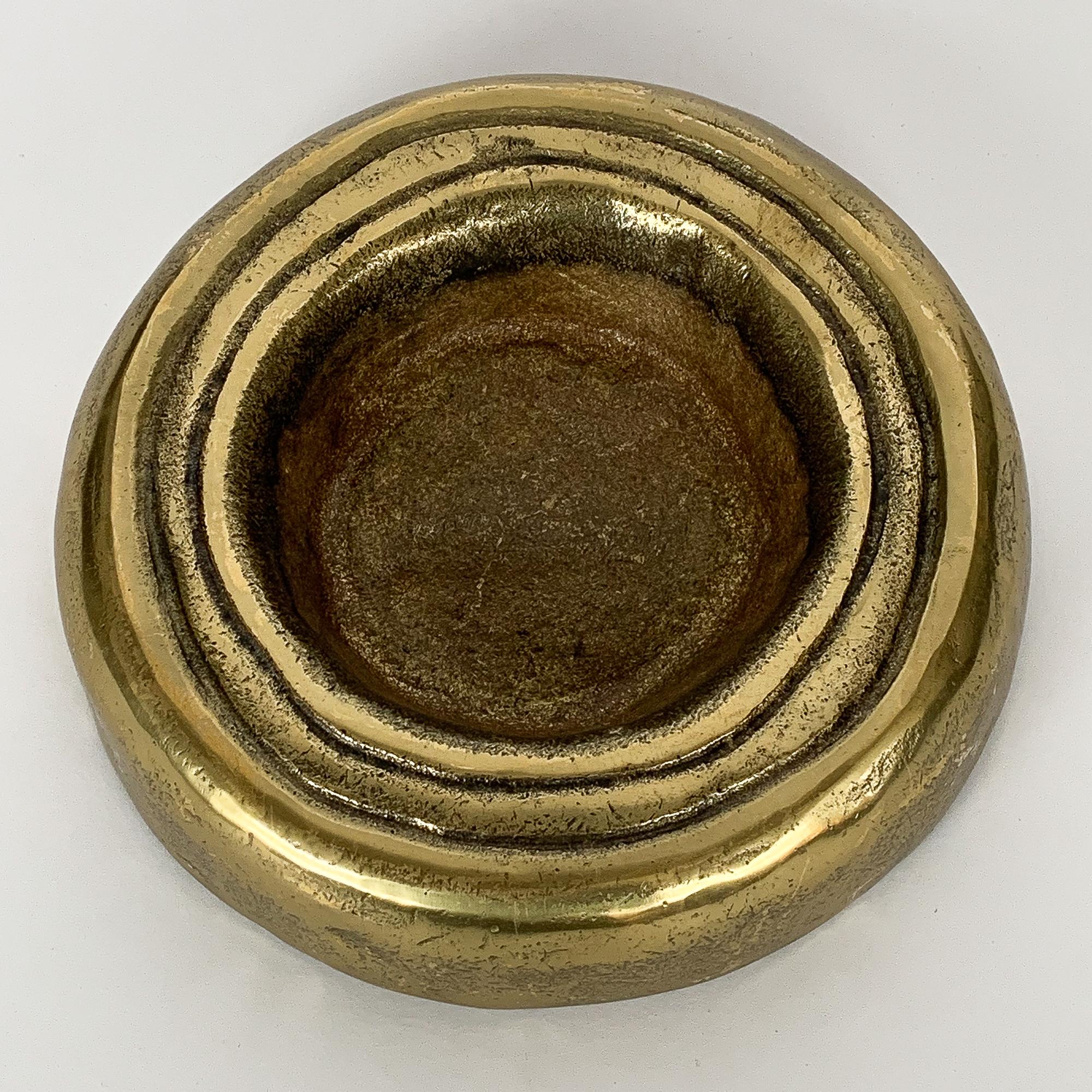 A solid cast brass bowl or vide poche in the Brutalist style, circa 1960s. Round 7