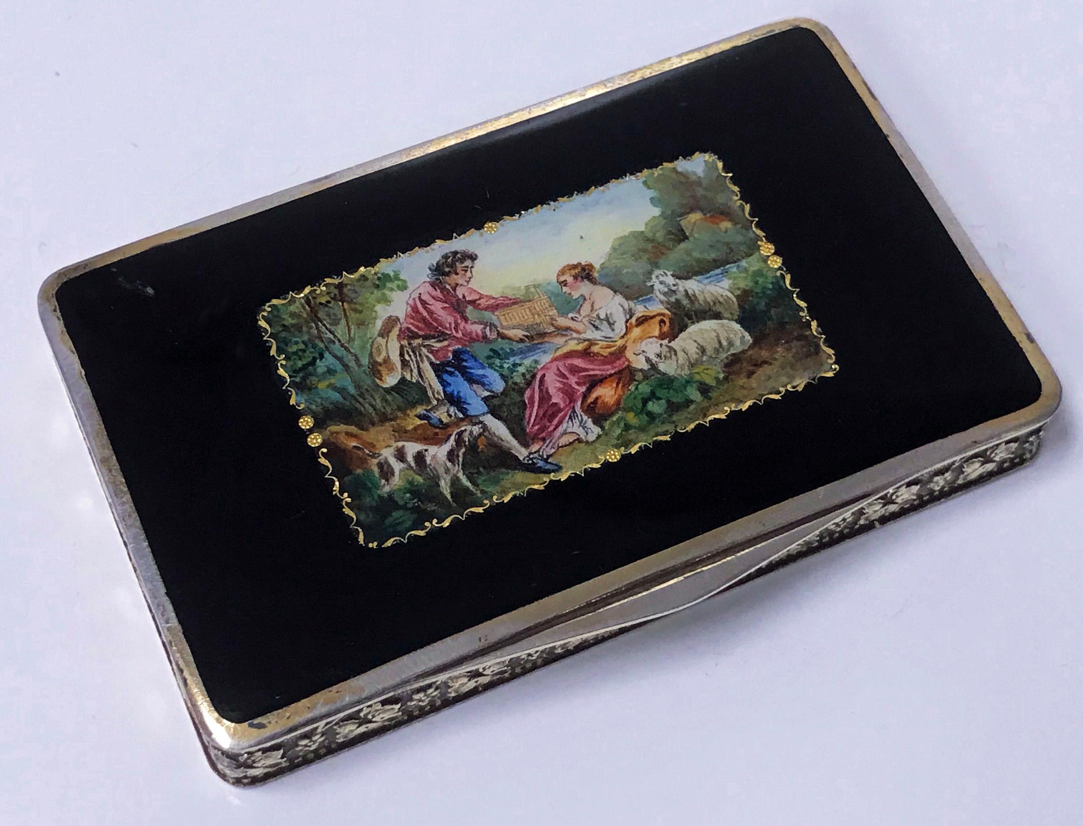 1920’s Austrian Sterling Silver hand painted enamel Box or Snuff Box with romantic pastoral scene, rosette foliage vermeil sides, engine turned base and gilded interior. Austrian hallmarks and also stamped Sterling Silver and number 946 on interior.