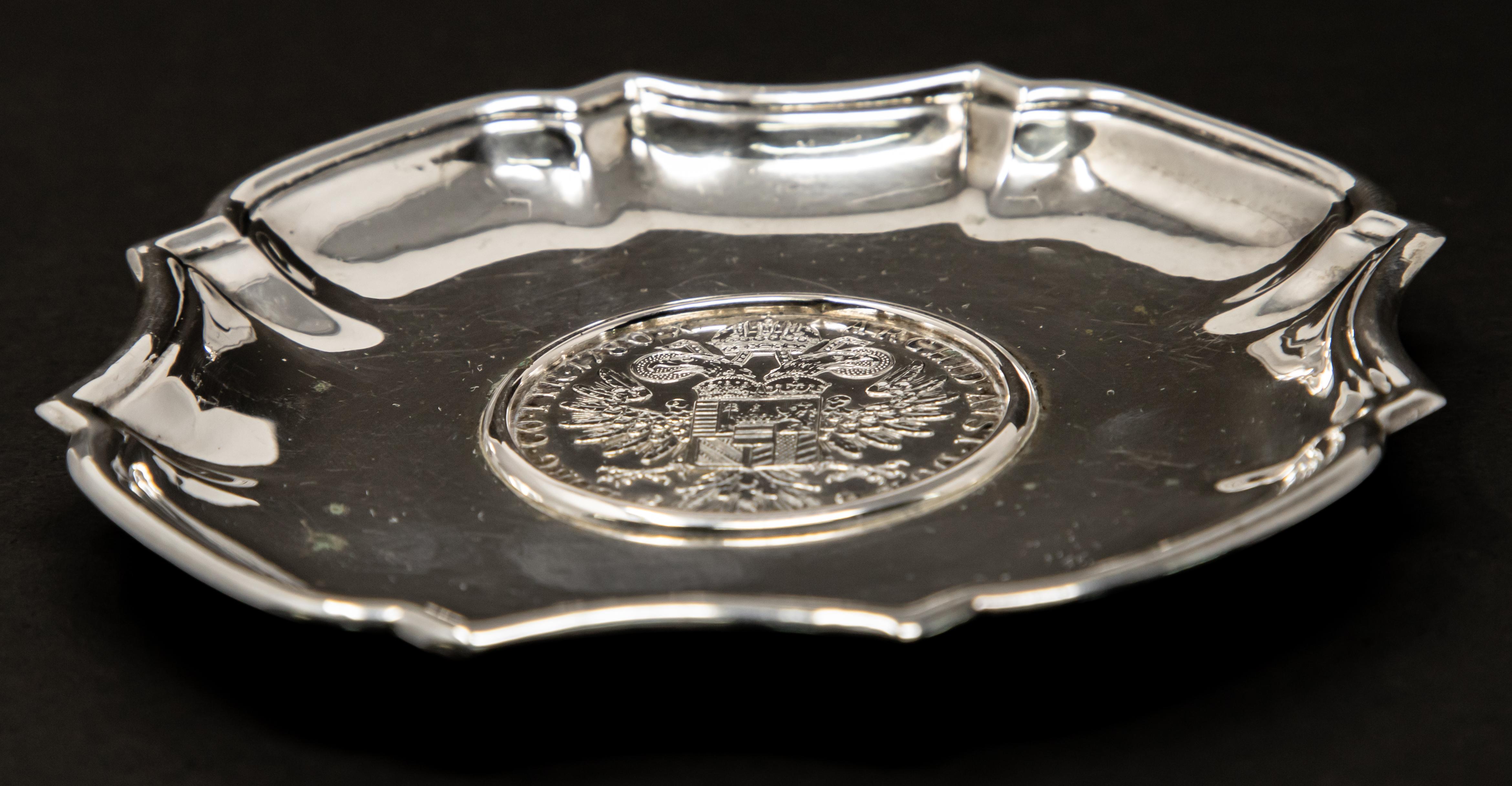 Offering this beautiful Austrian sterling silver dish with a coin center. The coin is marked with BURG-CO-TYR-1780-X, ARCHID-AVST-DUX on one side of the coin and the other side is marked R-IMP-HU-BO-REG, M. THERESIA.D.G. And under the bust is marked