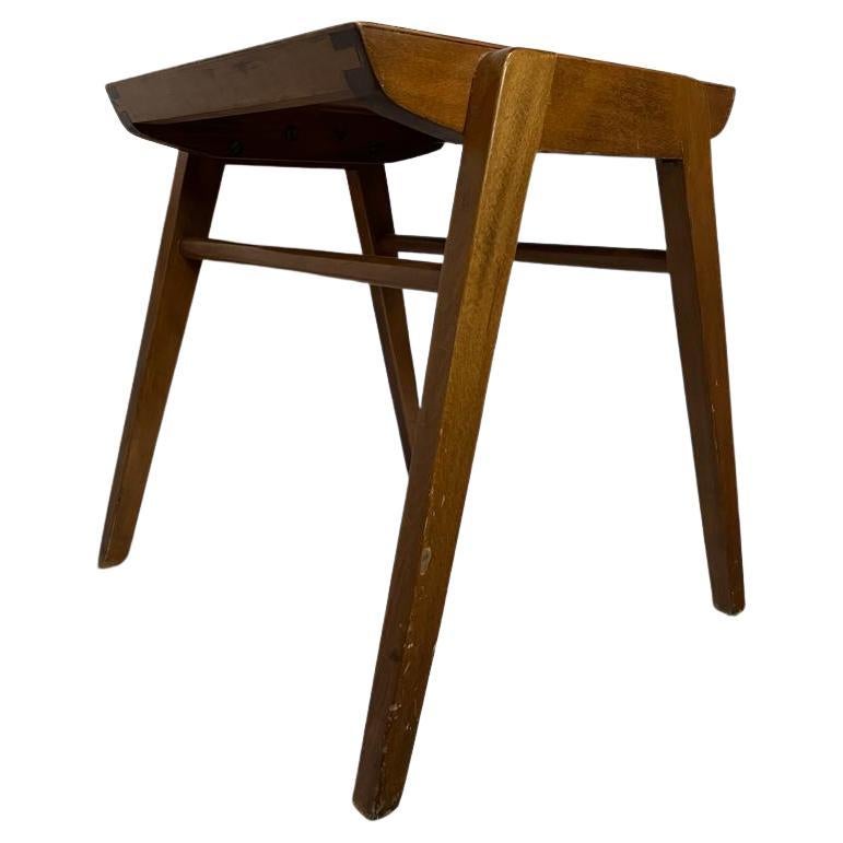 Austrian stool made of beech, design by Roland Rainer 1955.
 