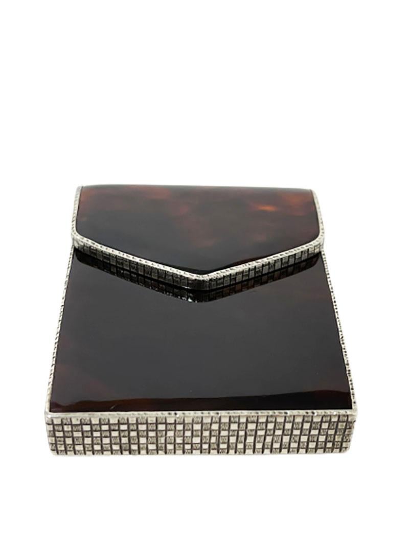 Austrian Tortoise shell Silver box

Austrian Tortoise shell Silver box in the shape of an envelope with a flap. 
The flap is with a spring. 
The box is marked with the Austrian Silver hall mark 