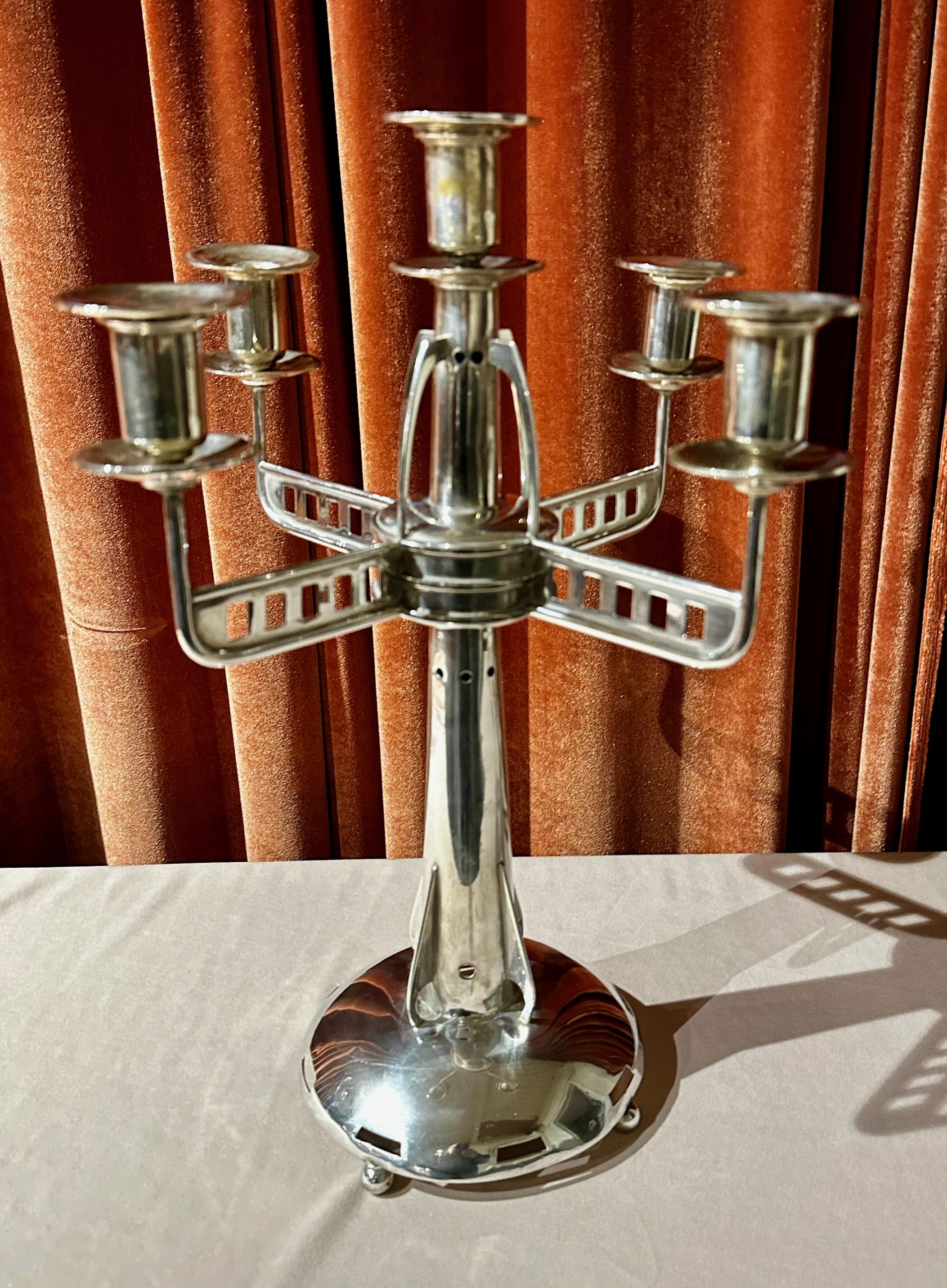 Austrian Vienna Secession silver candelabra Circa 1910. This massive and sculptural design is silver with the Austrian maker mark HS and of the head of Diana. Over 1050 grams of silver. Fantastic design and it is scarce to see any work of this size