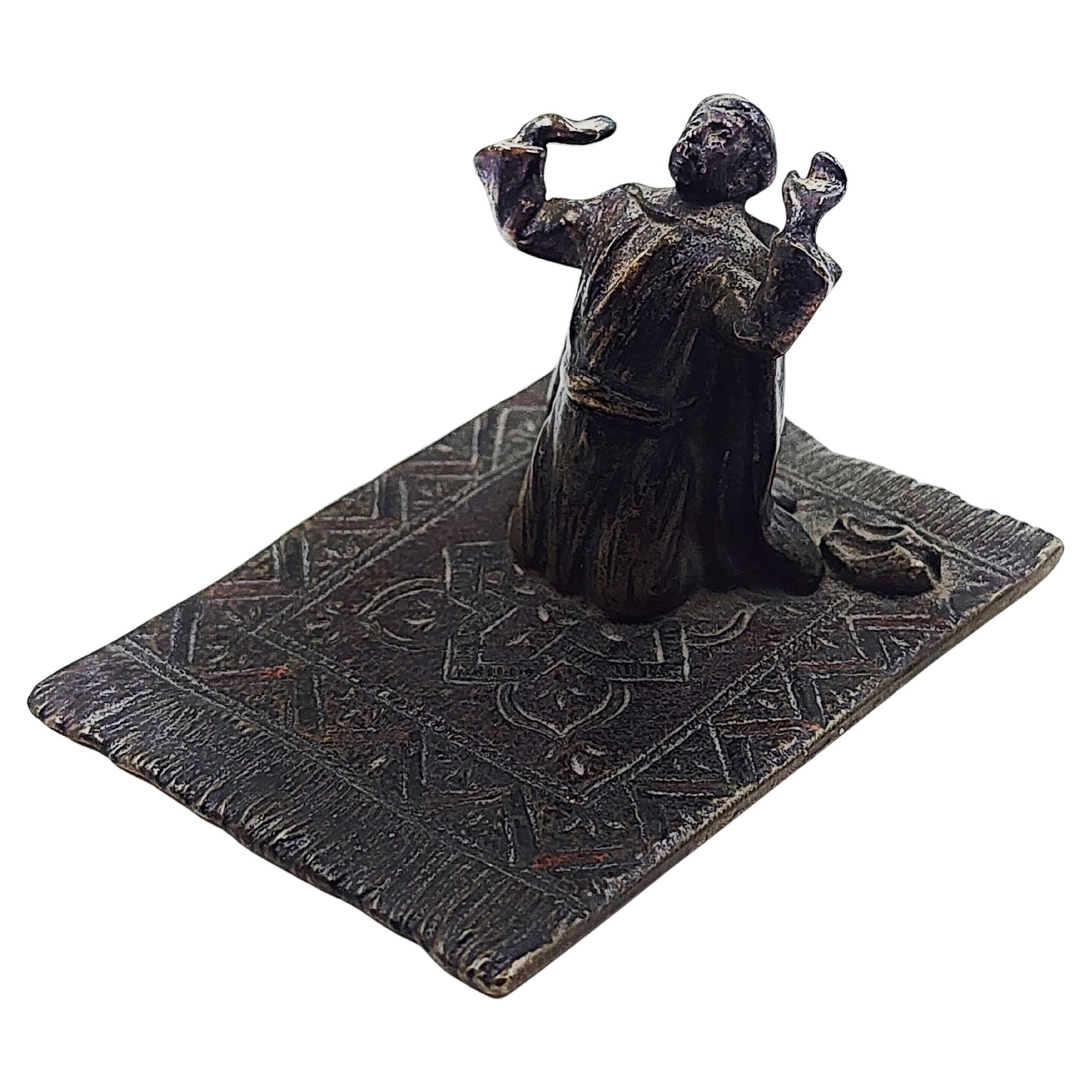 Austrian Viennese bronze of a man practicing salat