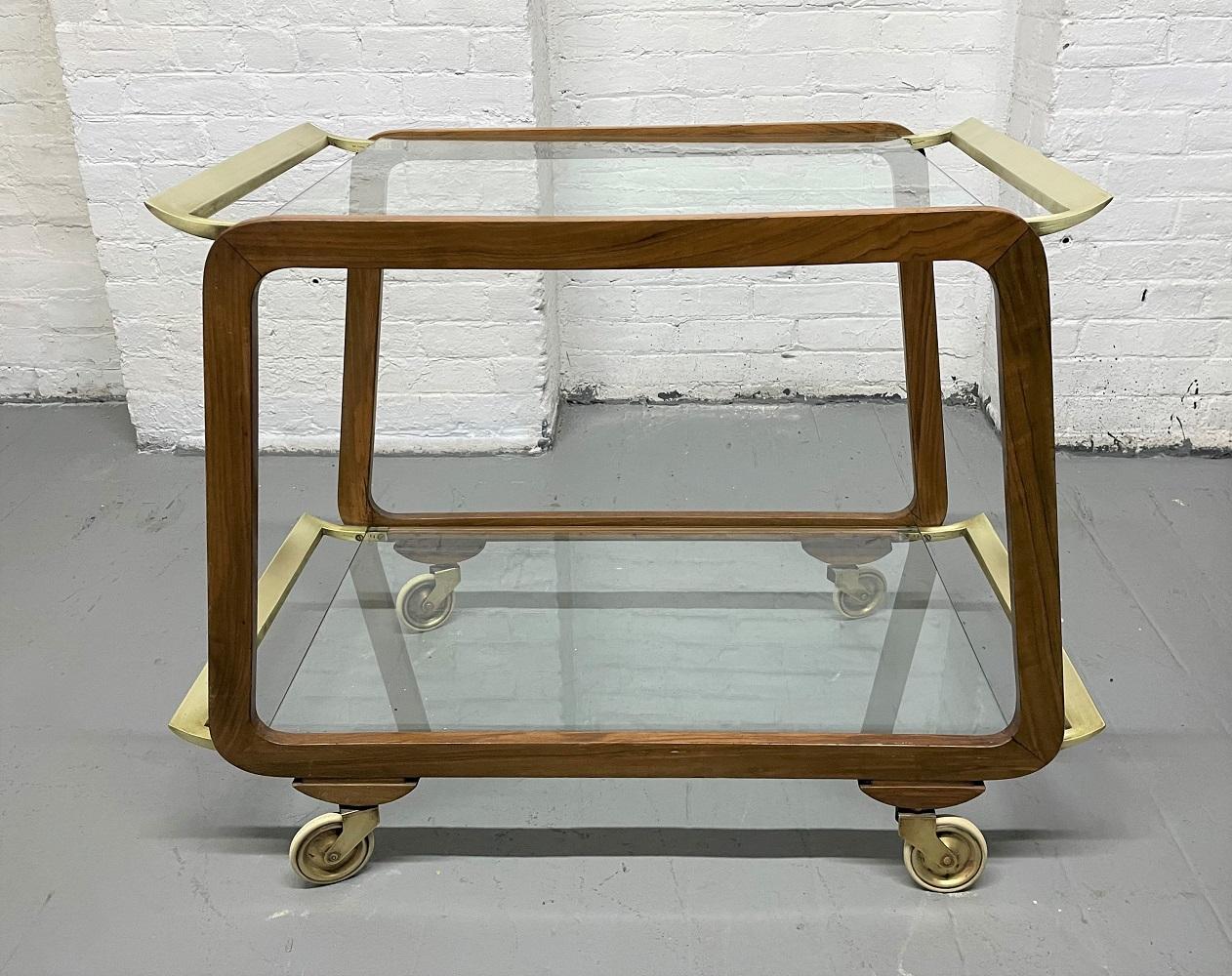 Mid-Century modern, Austrian walnut and brass bar cart / trolley. Two-tier cart, brass handles with clear glass shelves.