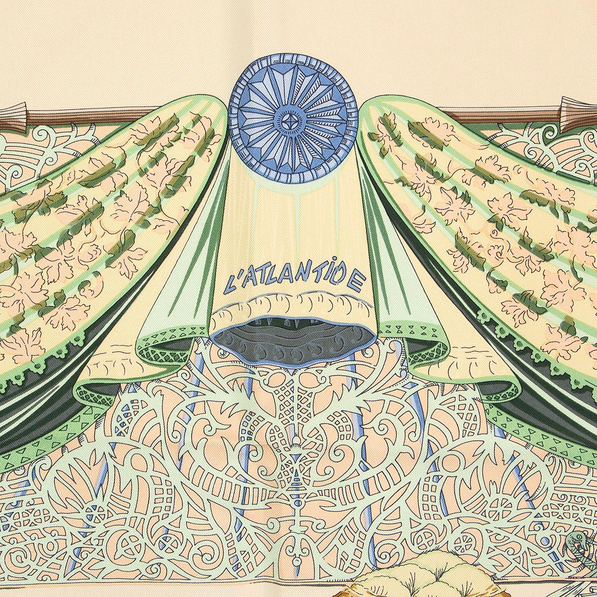 Hermes 'L'Atlantide 90' scarf by Annie Faivre in beige silk twill (100%) with details in green, grey and brown. Has been worn and is in excellent condition.

Width 90cm (35.1in)
Height 90cm (35.1in)