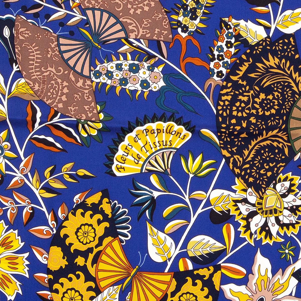 Hermes 'Fleurs et Papillon de Tissus 90' scarf by Christine Henry in dark blue silk twill (100%) with contrast white hem and details in various shades of yellow and brown. Has been worn and is in excellent condition.

Width 90cm (35.1in)
Height 90cm