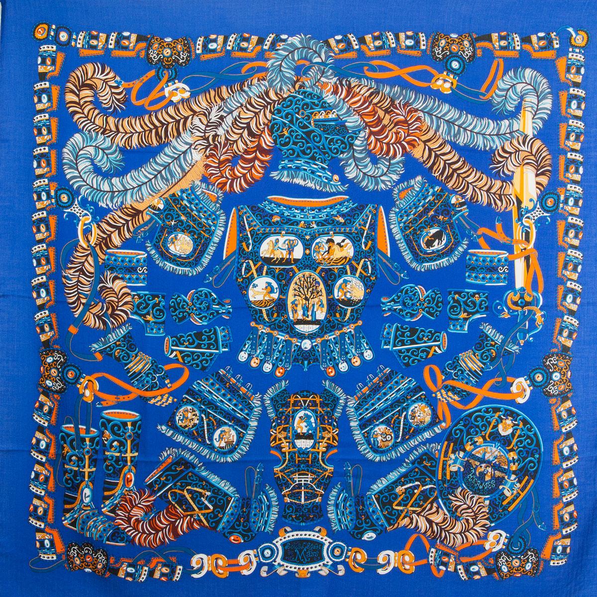 Hermes 'Sous l'Egide de Mars 140' shawl by Pierre Marie in Bleu Royal/Orange/Brun cashmere (70%) and silk (30%). Has been worn and is in virtually new condition.

Width 140cm (55in)
Height 140cm (55in)
