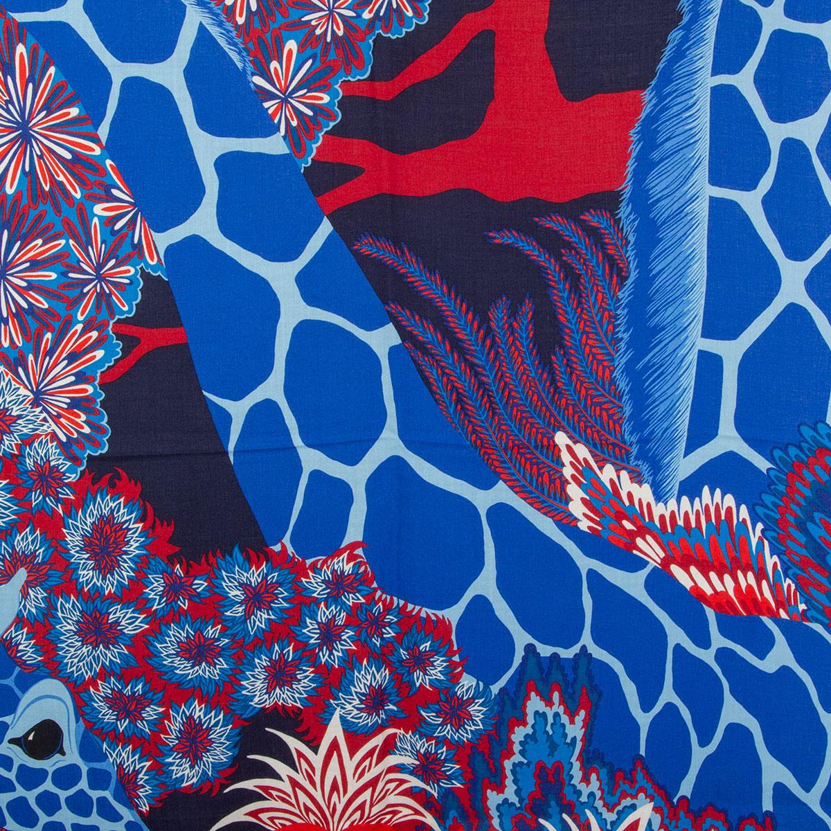 Hermes 'The Three Graces 140' shawl by Alice Shirley in midnight blue cashmere (70%) and silk (30%) with contrasting red hem and detail in blue, red and white. Has been worn and is in excellent condition.

Width 140cm (55in)
Height 140cm (55in)